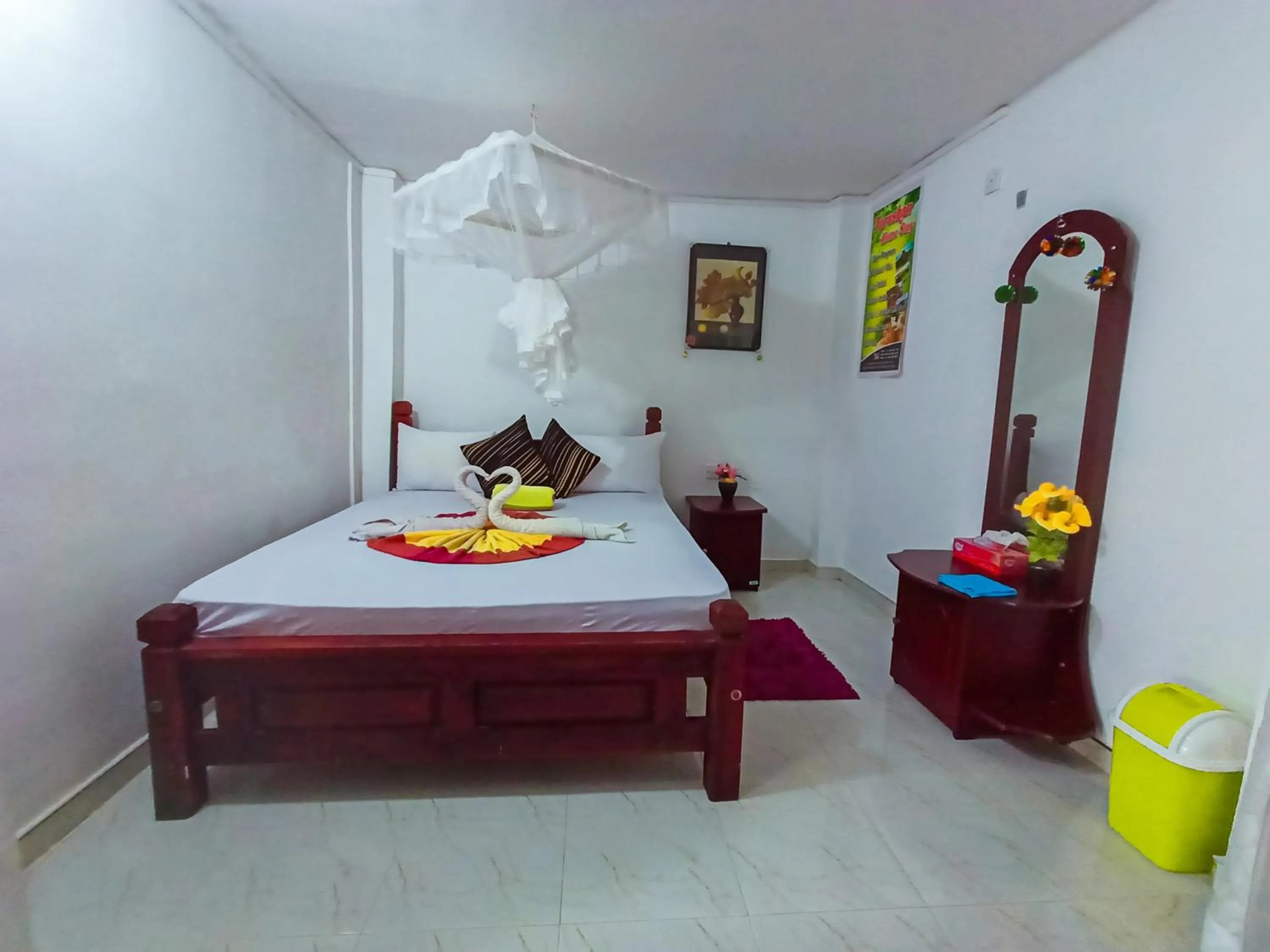 Bed in Sigiri Tarushan Home Stay