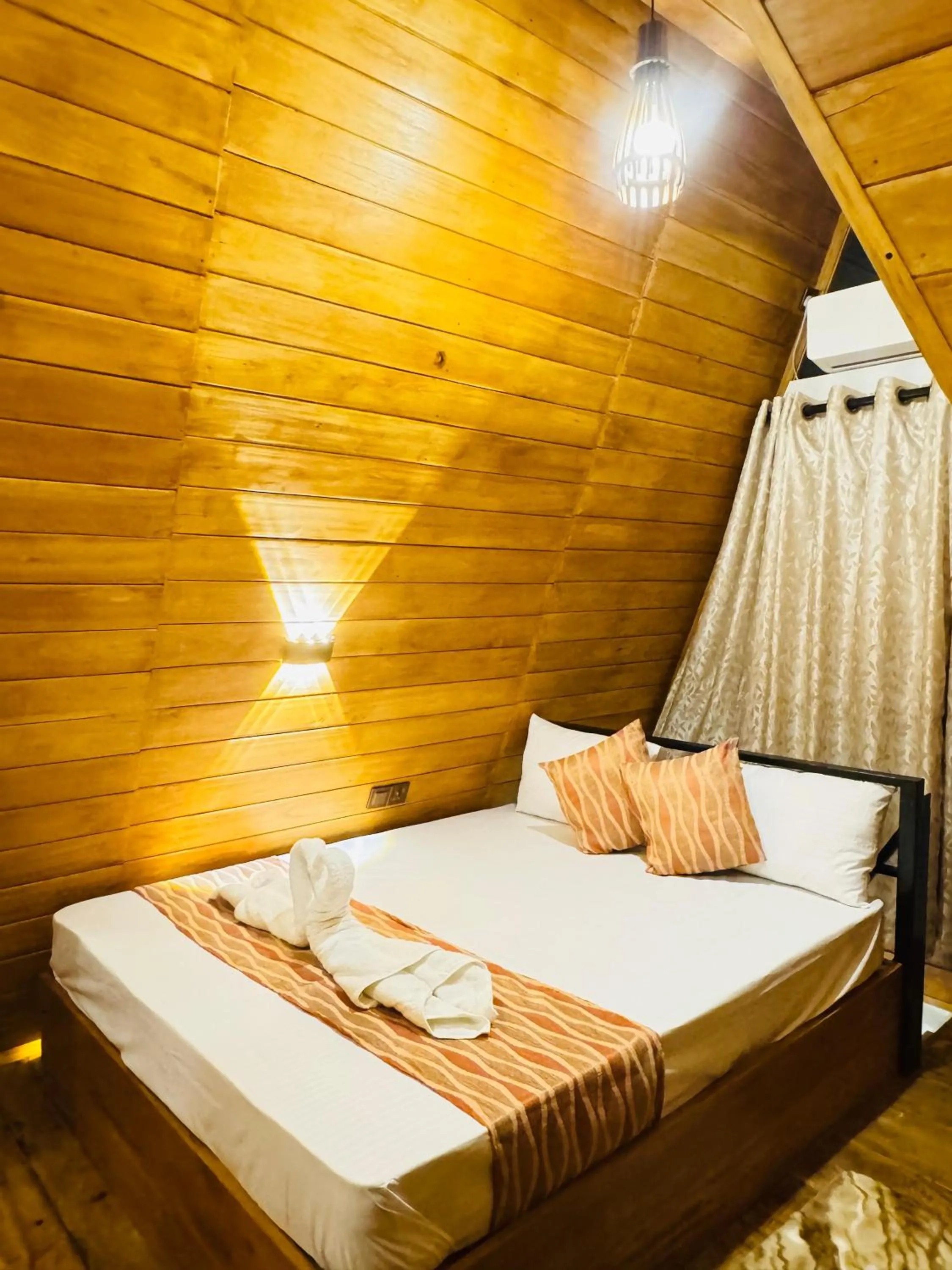 Bed in Sigiri Tarushan Home Stay