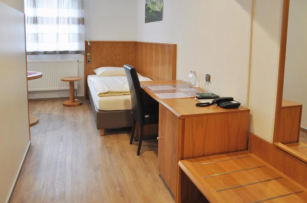 Bed in Garni Hotel Alber