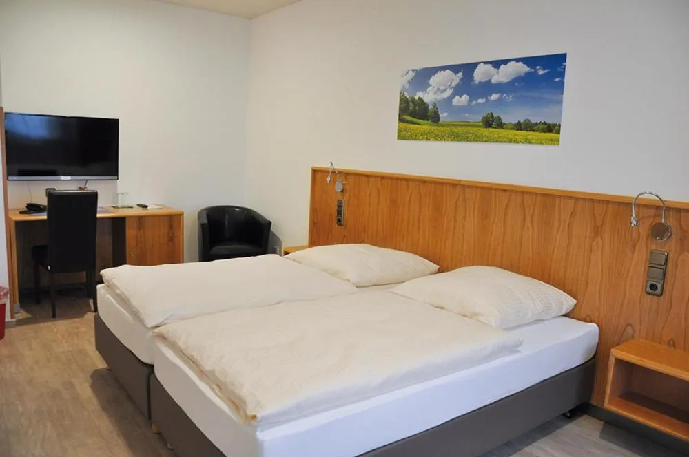 Bed in Garni Hotel Alber
