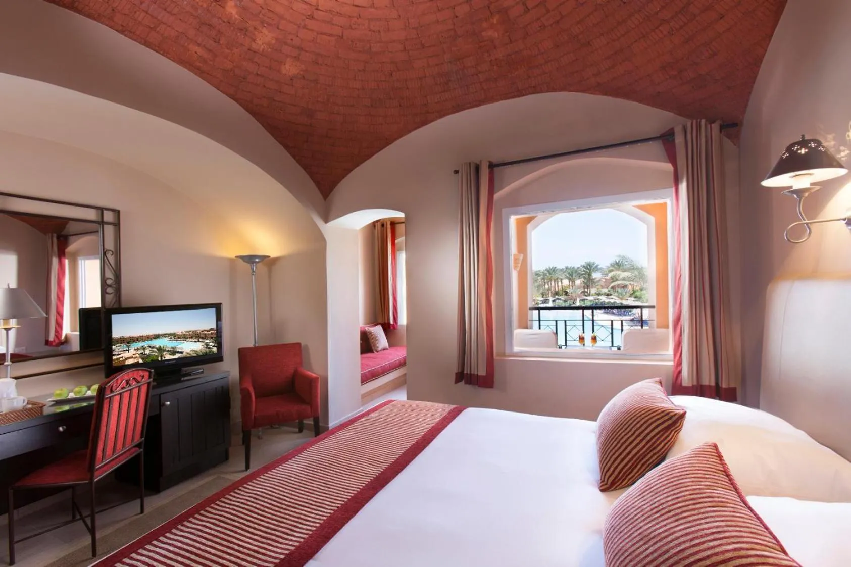 Photo of the whole room, Bed in JAZ Makadi Oasis Resort