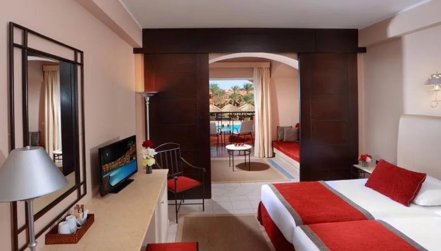 Photo of the whole room, Bed in JAZ Makadi Oasis Resort