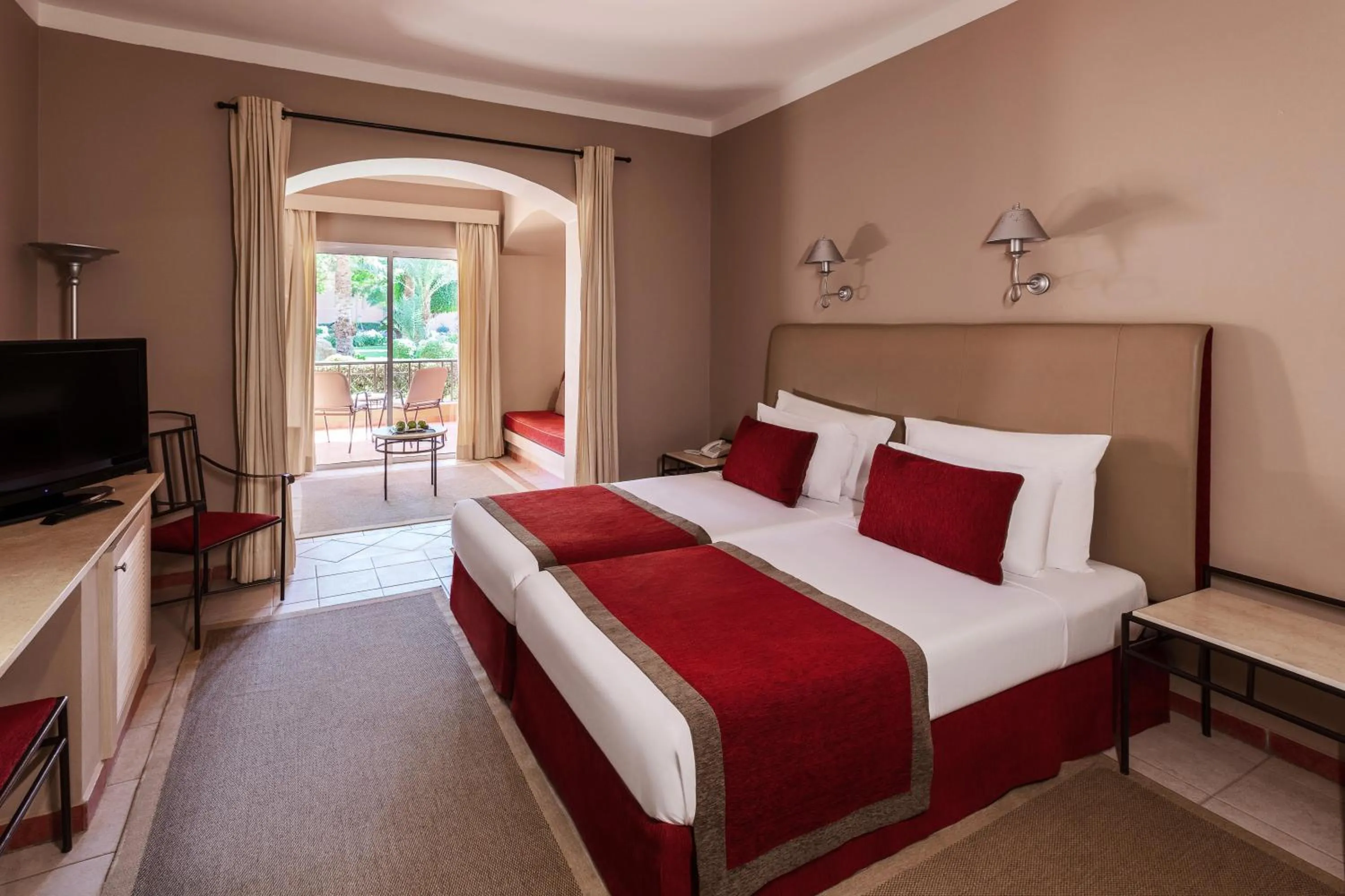 Photo of the whole room, Bed in JAZ Makadi Oasis Resort