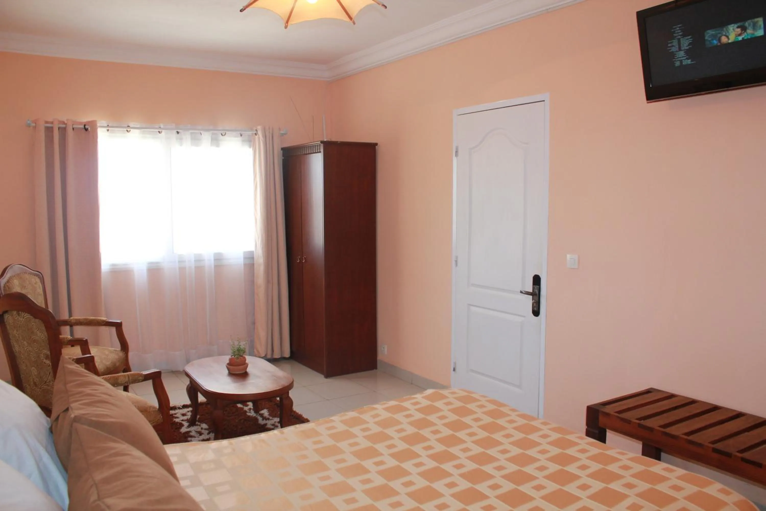 Bedroom in K.méléon-Hôtel