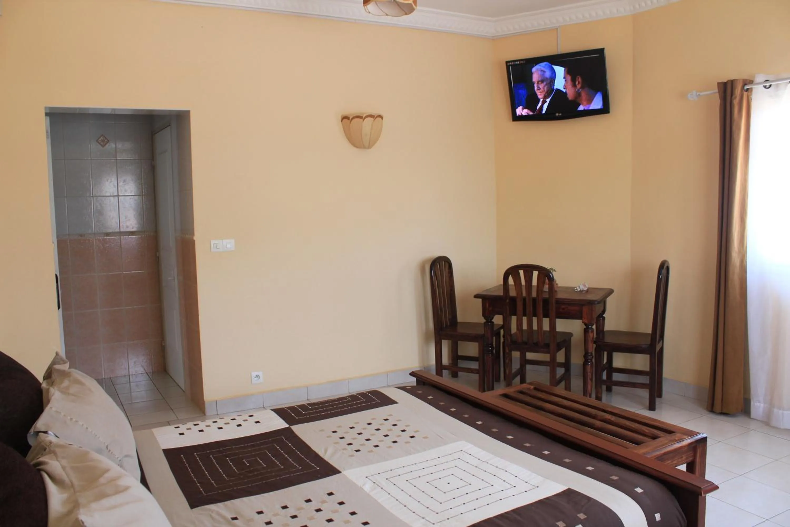Bedroom in K.méléon-Hôtel