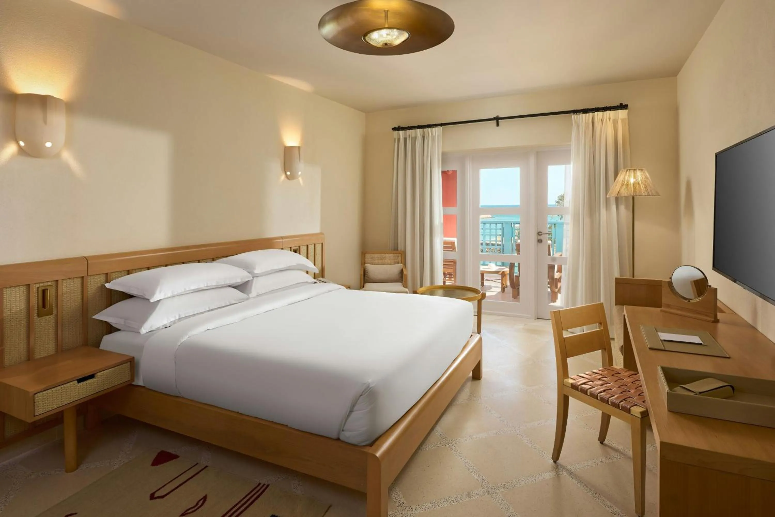 Photo of the whole room, Bed in Sheraton Miramar Resort El Gouna