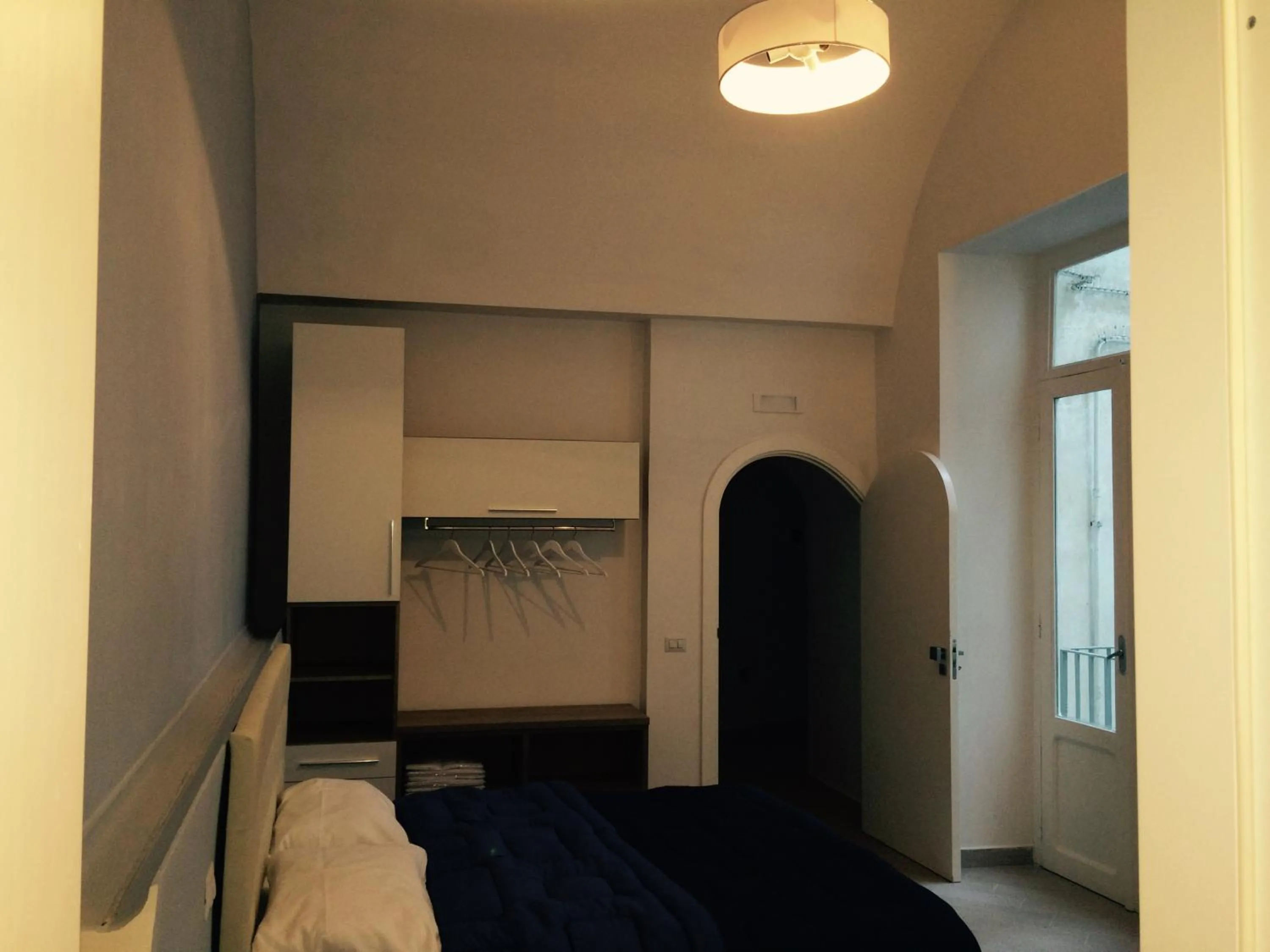 Photo of the whole room, Bed in Base Napoli Mergellina