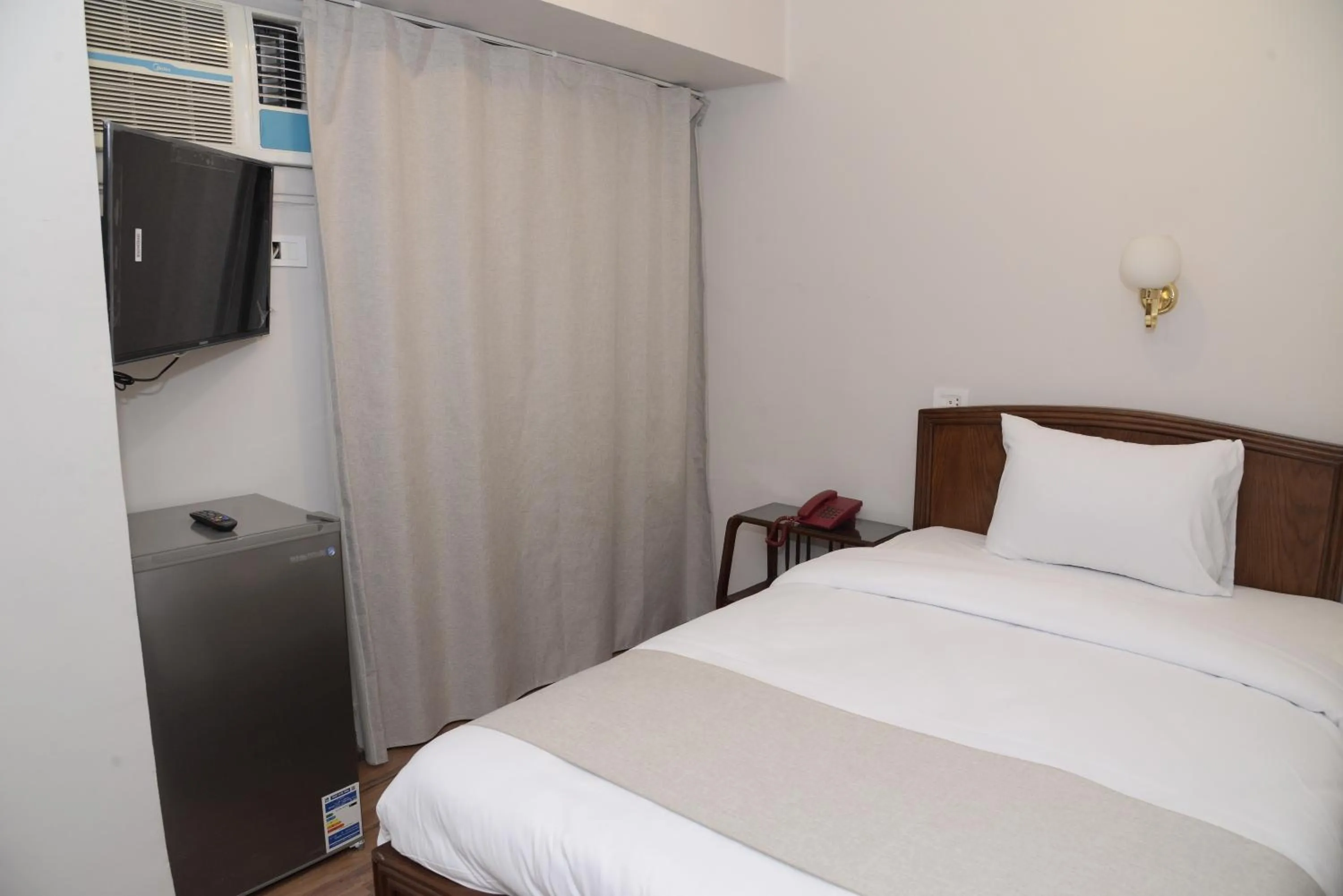 Bed in Lotus Hotel Cairo