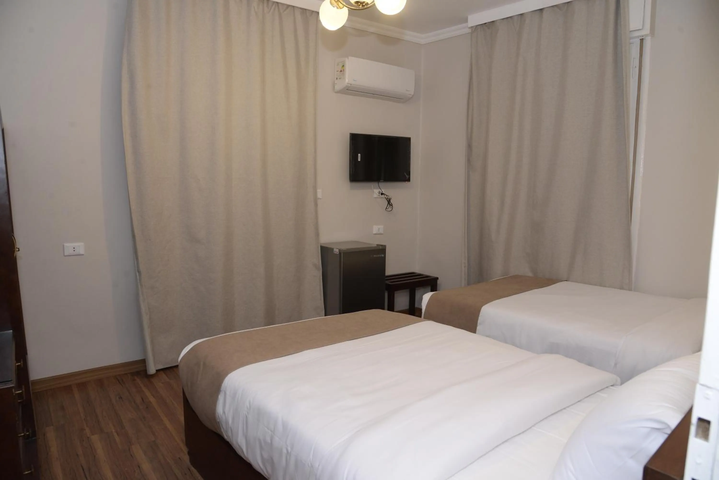 Bed in Lotus Hotel Cairo