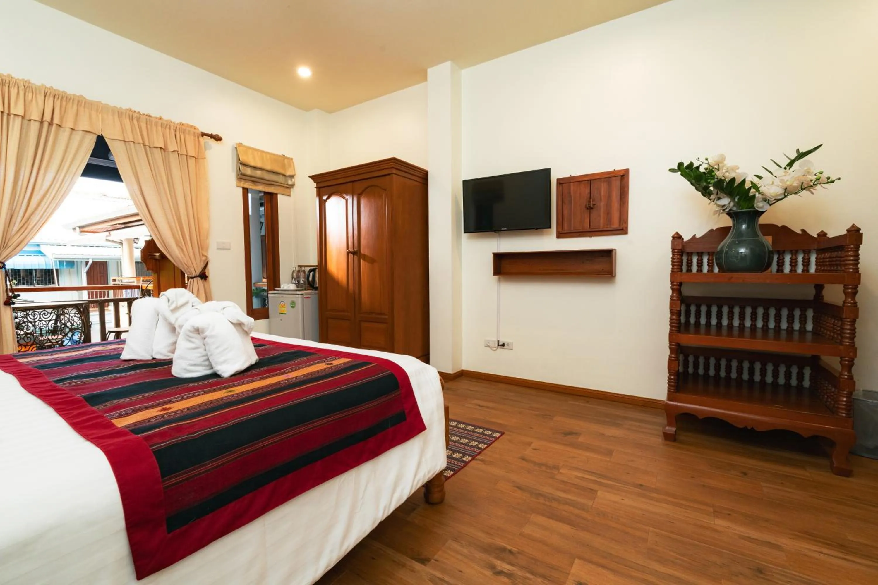 Photo of the whole room, Bed in Gordnuea Boutique House