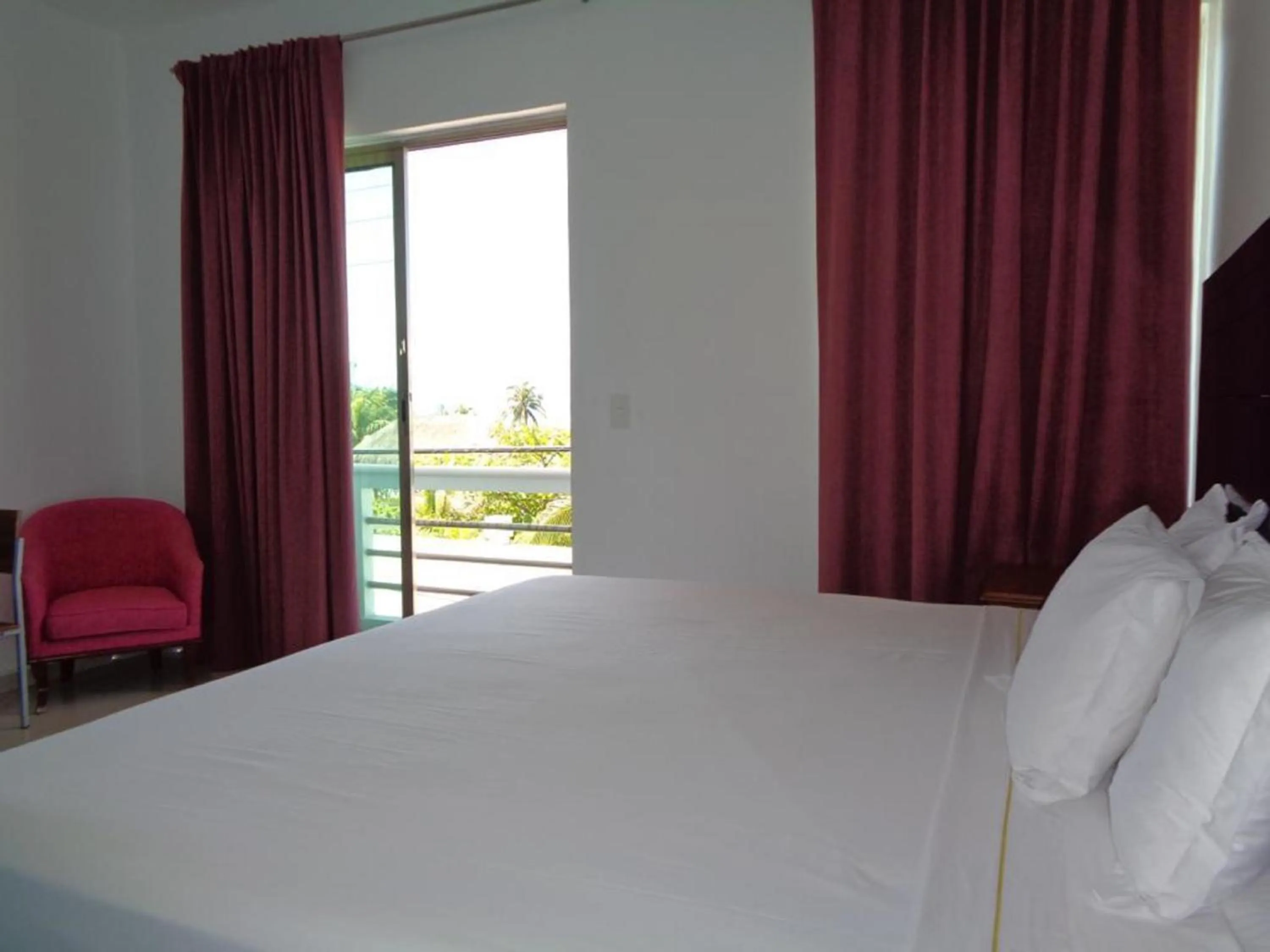 Bed in Villa Elena Isla Mujeres