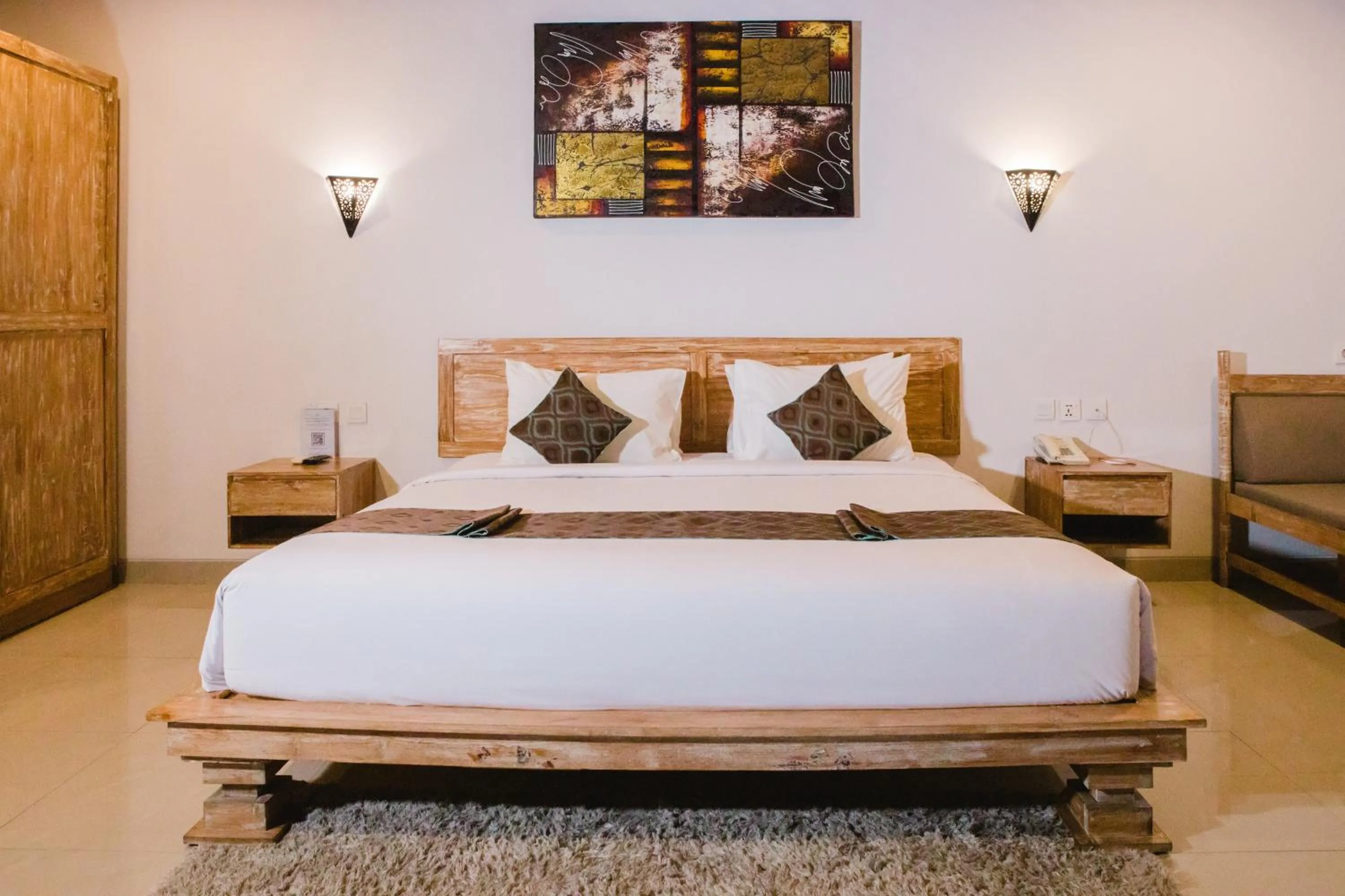 Bed in Grand Kesambi Resort and Villas Seminyak