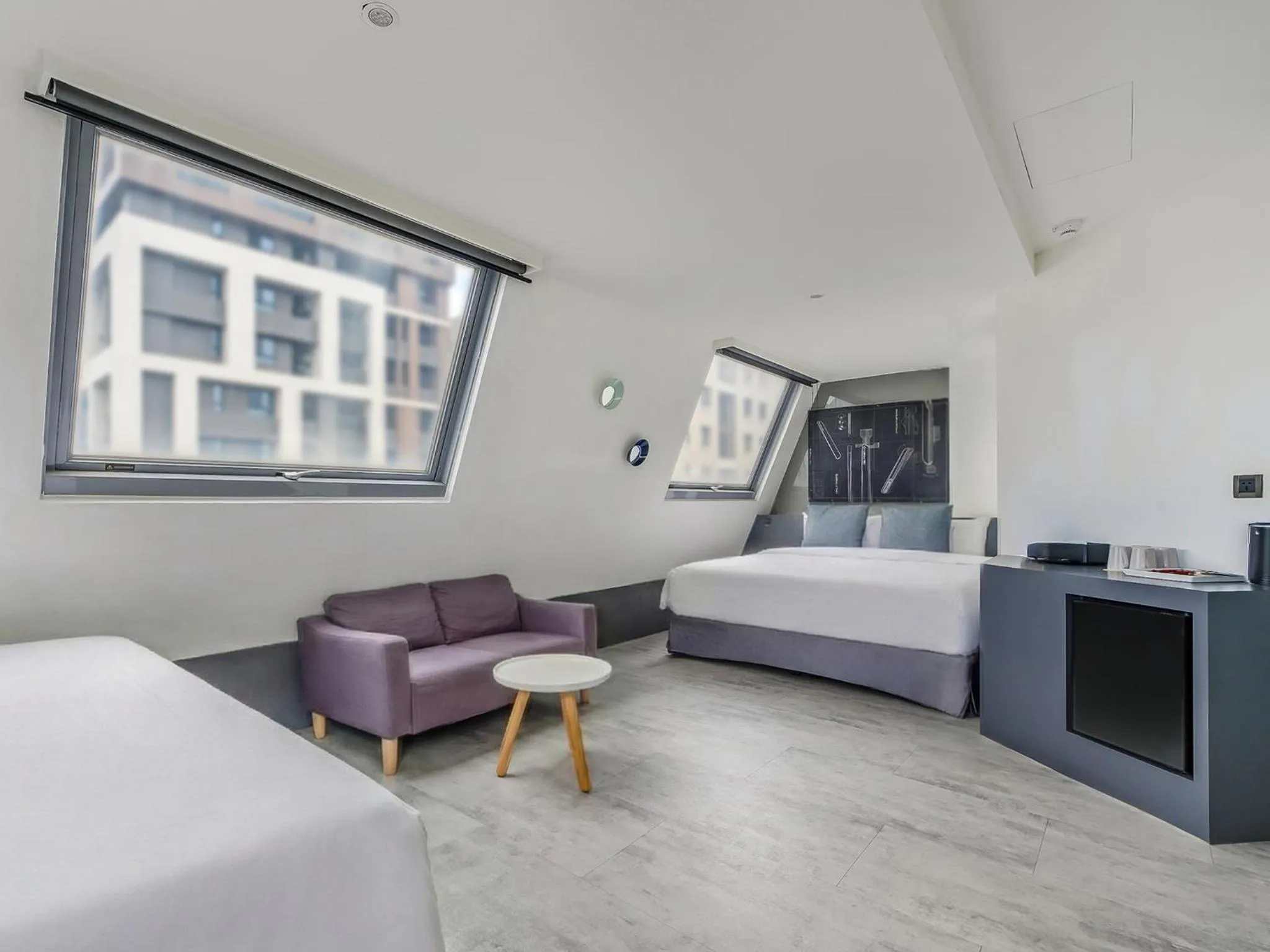 Bed in CHECK inn Taichung Liming