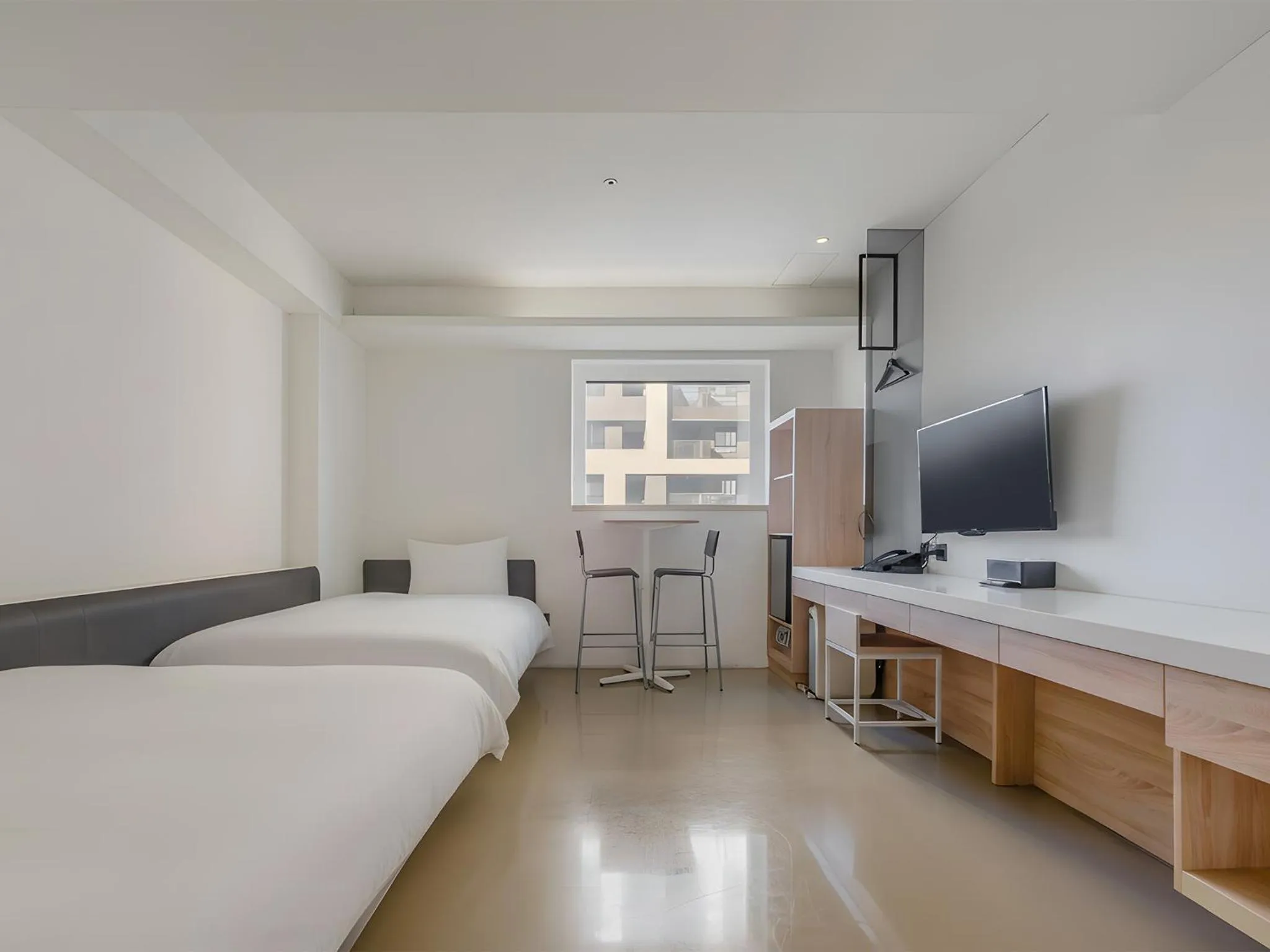 Bed in CHECK inn Taichung Liming