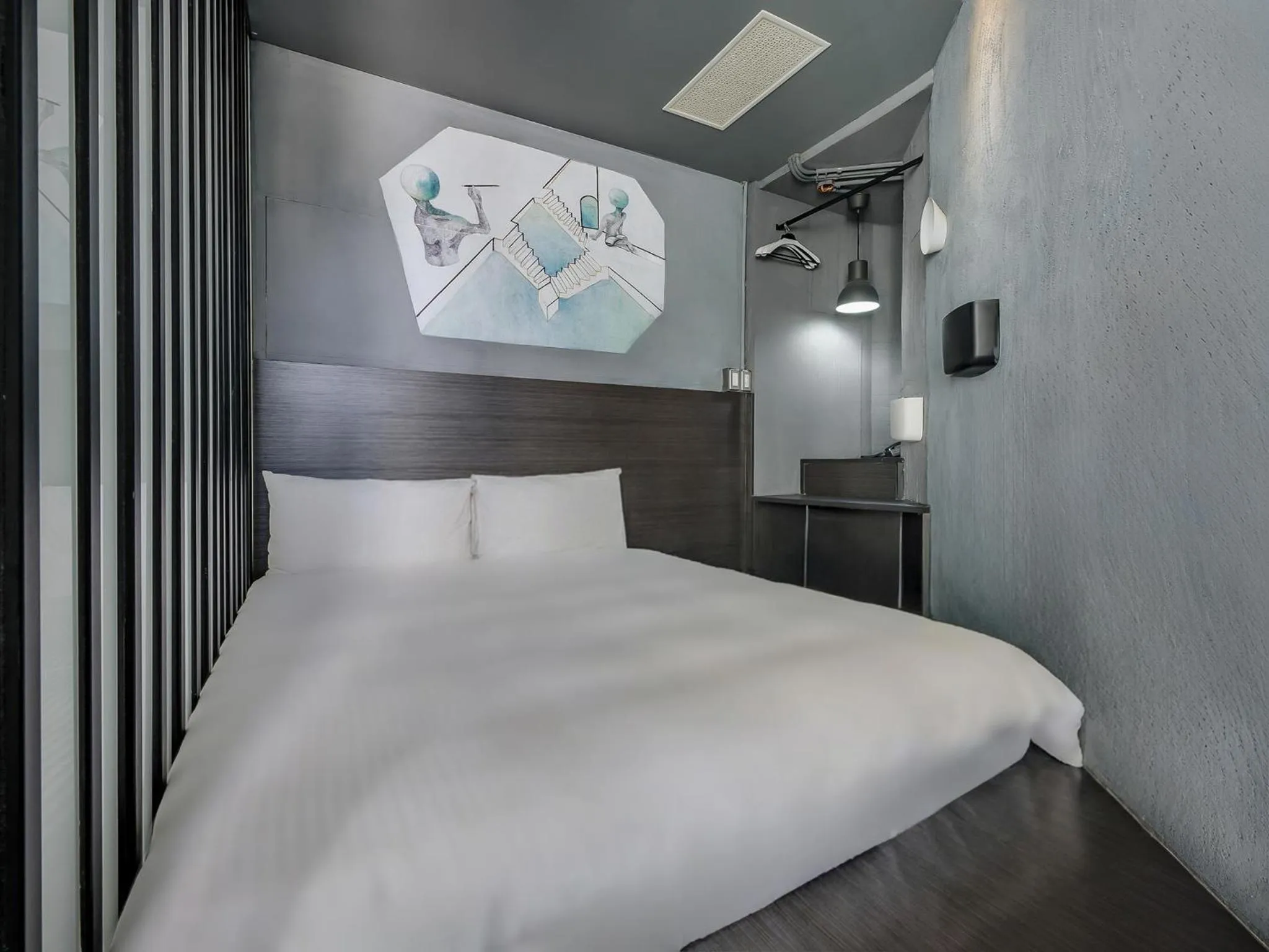 Bed in CHECK inn Taichung Liming
