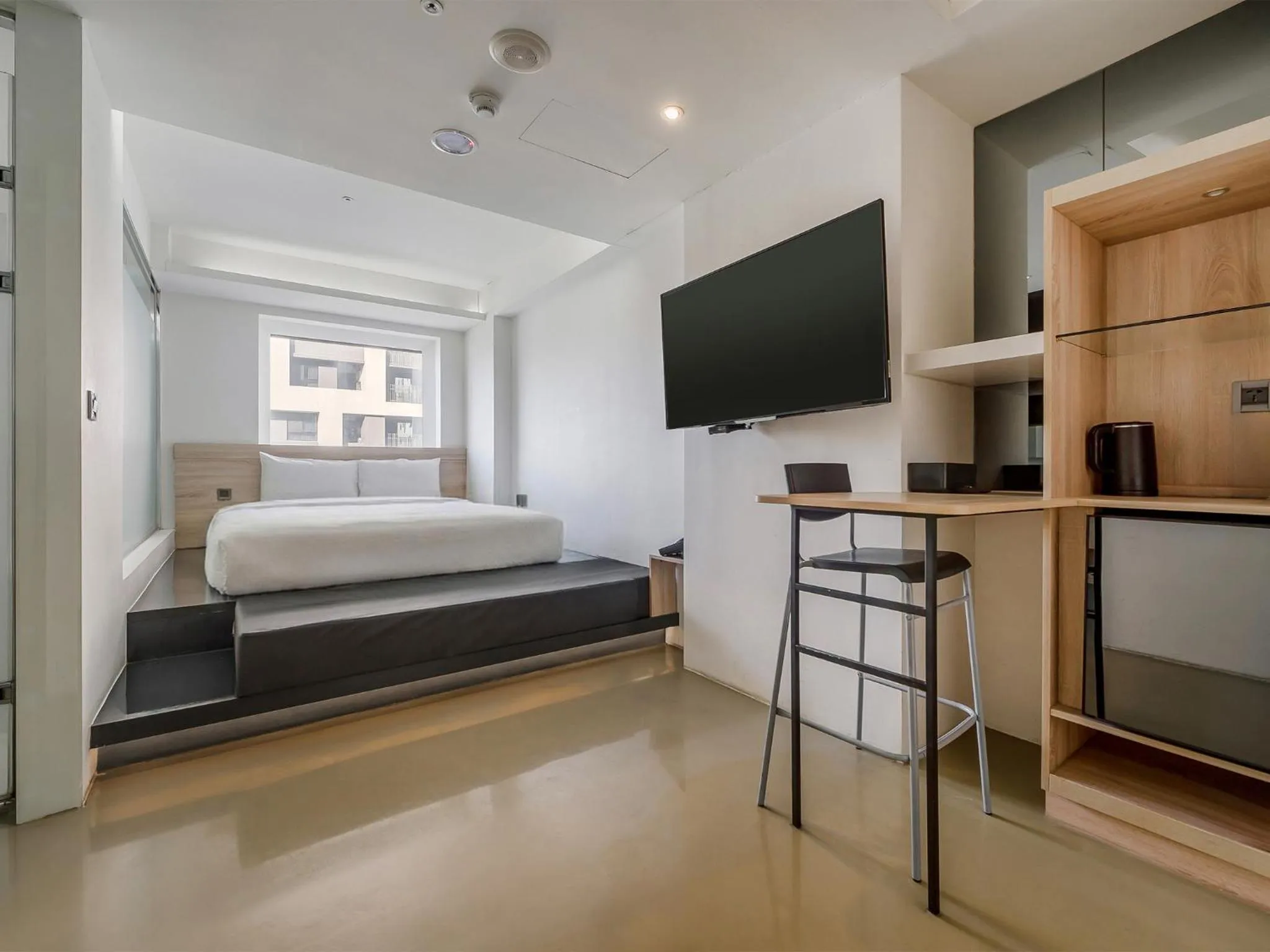 Bed in CHECK inn Taichung Liming