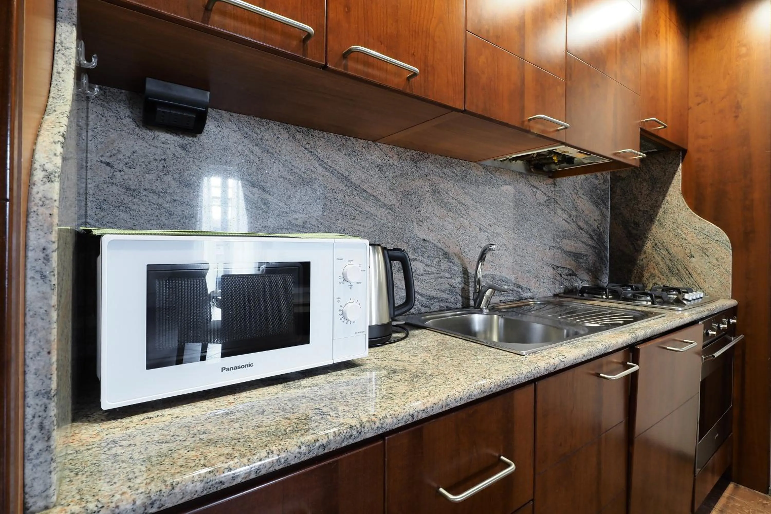 kitchen in Mila Apartments Magenta