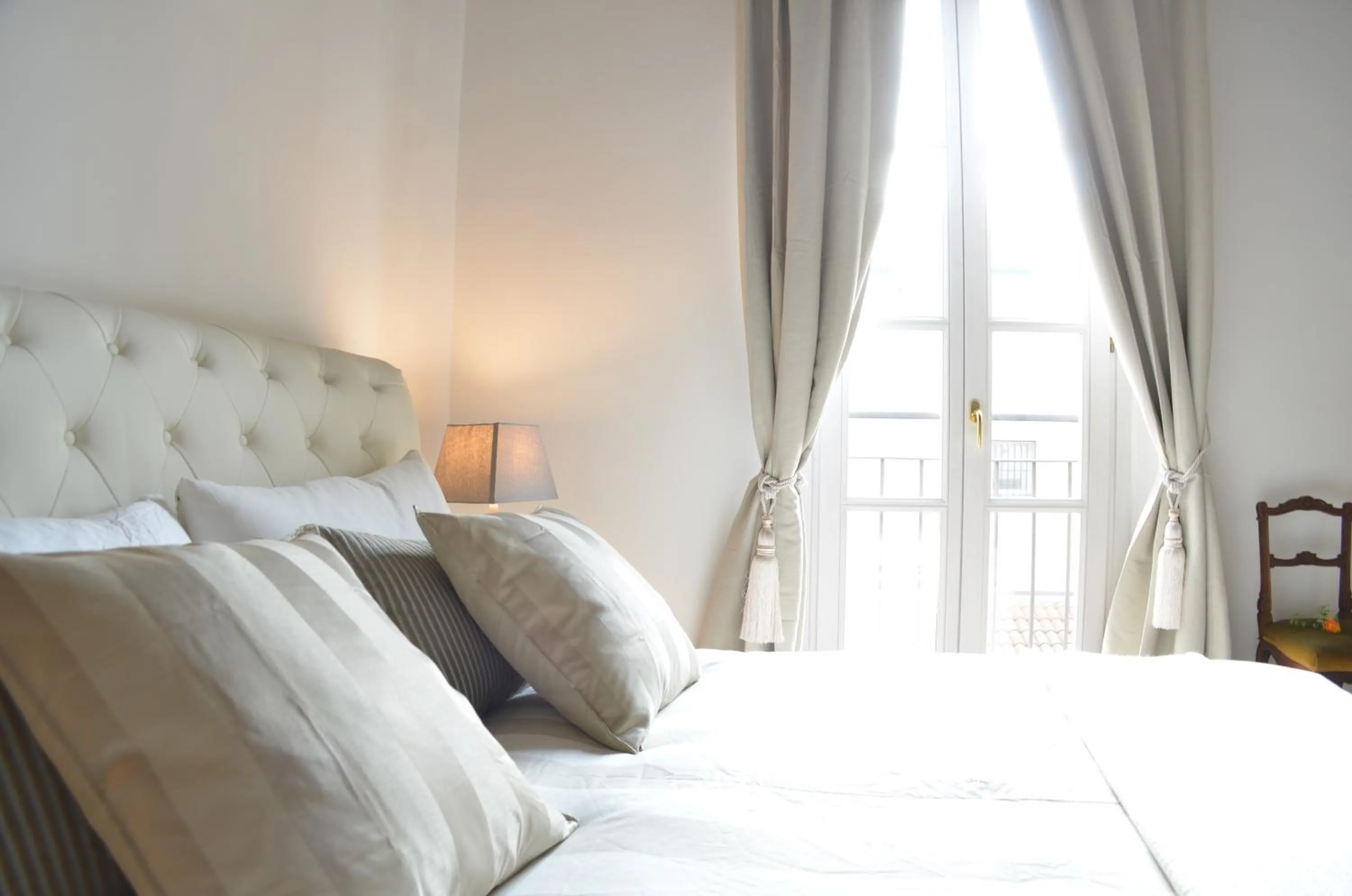 Bed in Mila Apartments Magenta