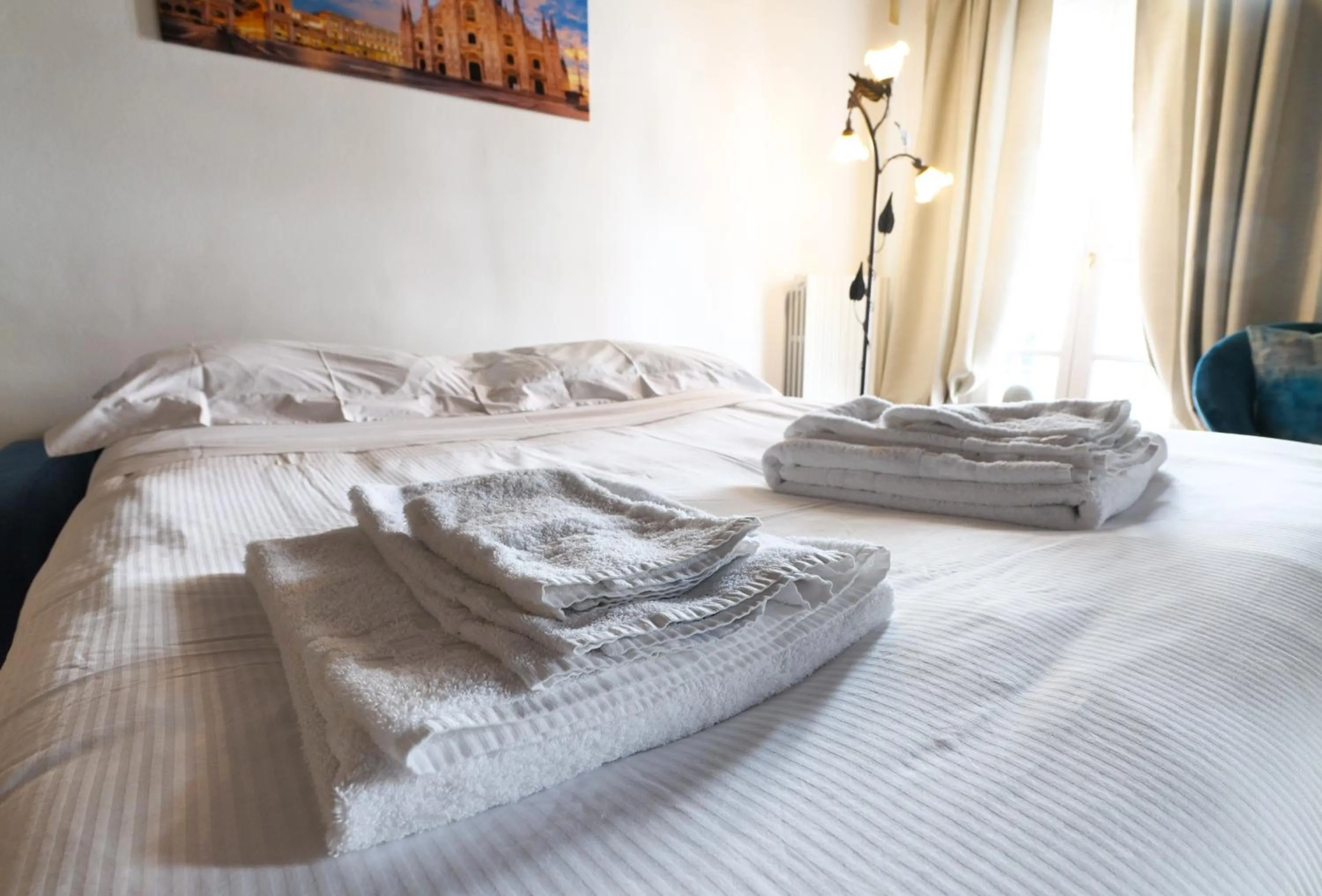 Bed in Mila Apartments Magenta