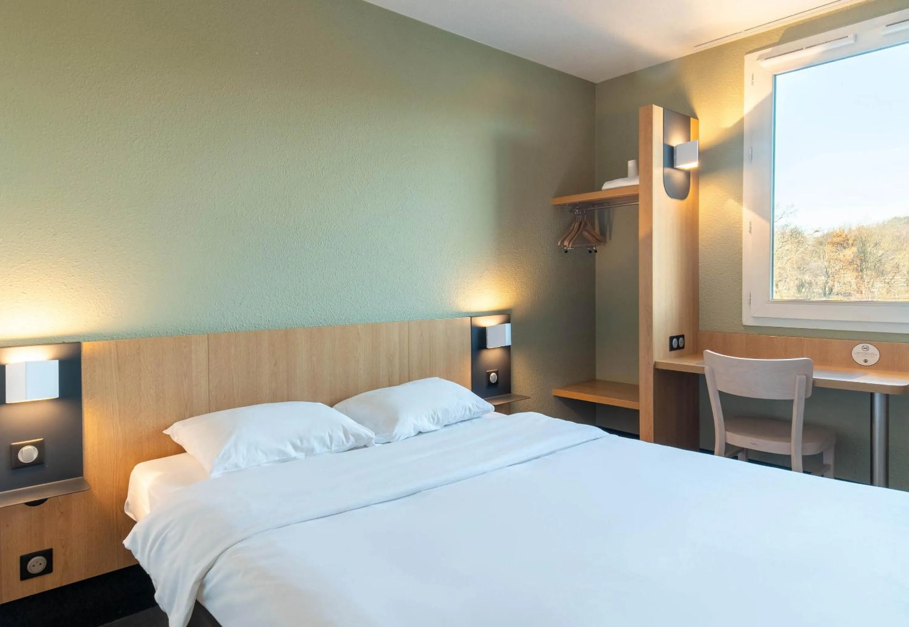 Bedroom, Bed in B&B HOTEL Brive-la-Gaillarde