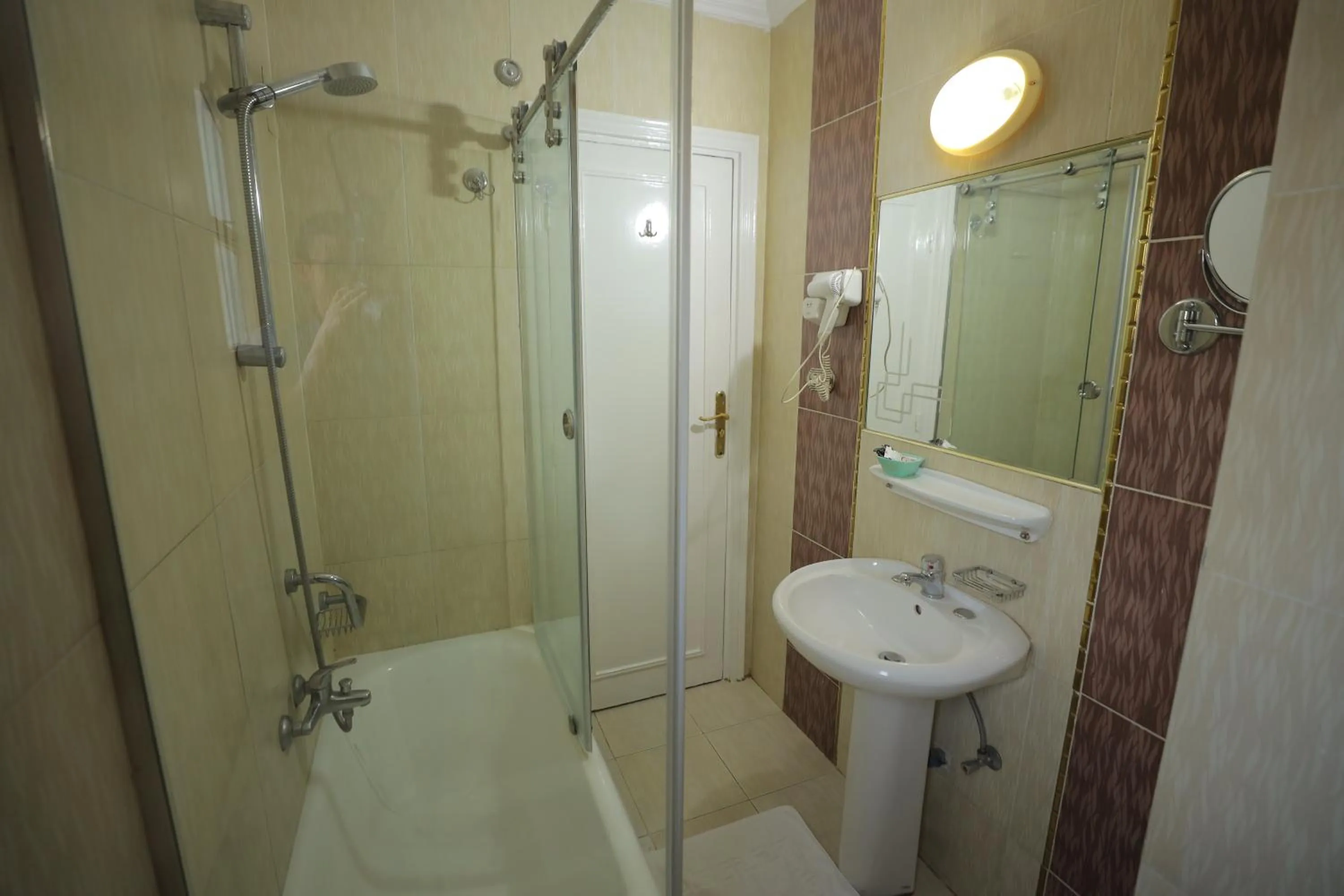 Bathroom in Happy City Hotel