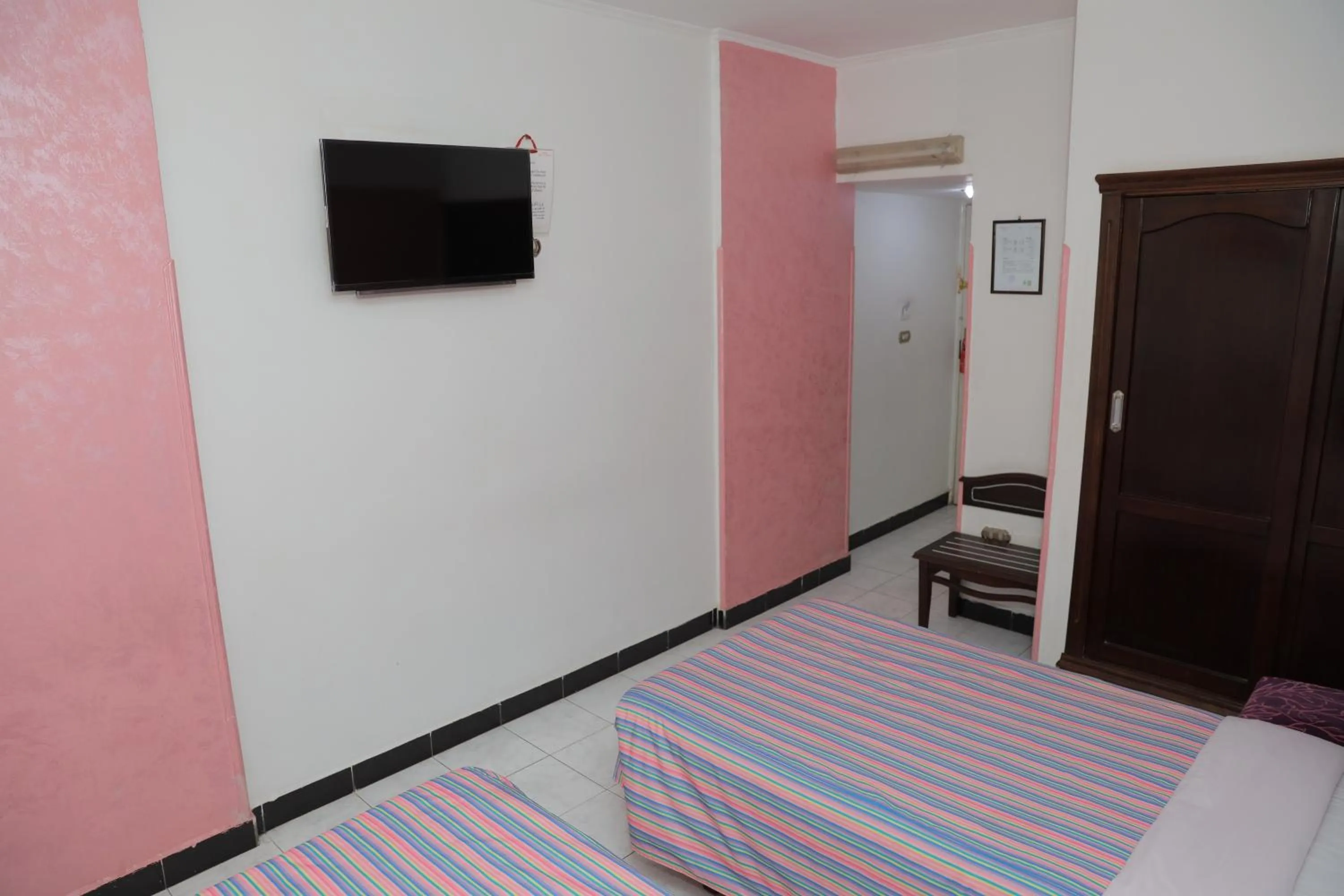 TV and multimedia, Bed in Happy City Hotel