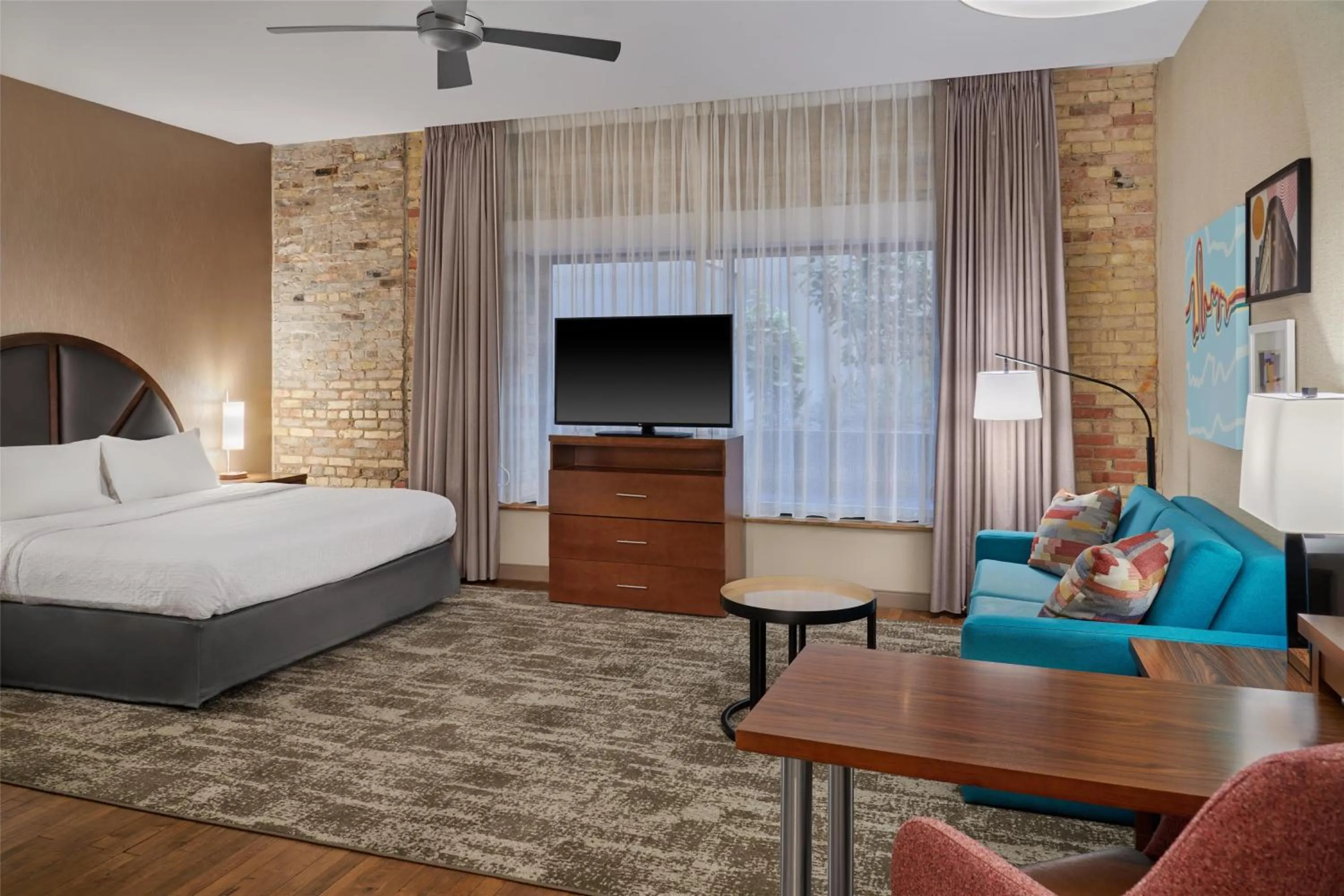 Living room, Bed in Homewood Suites by Hilton Grand Rapids Downtown