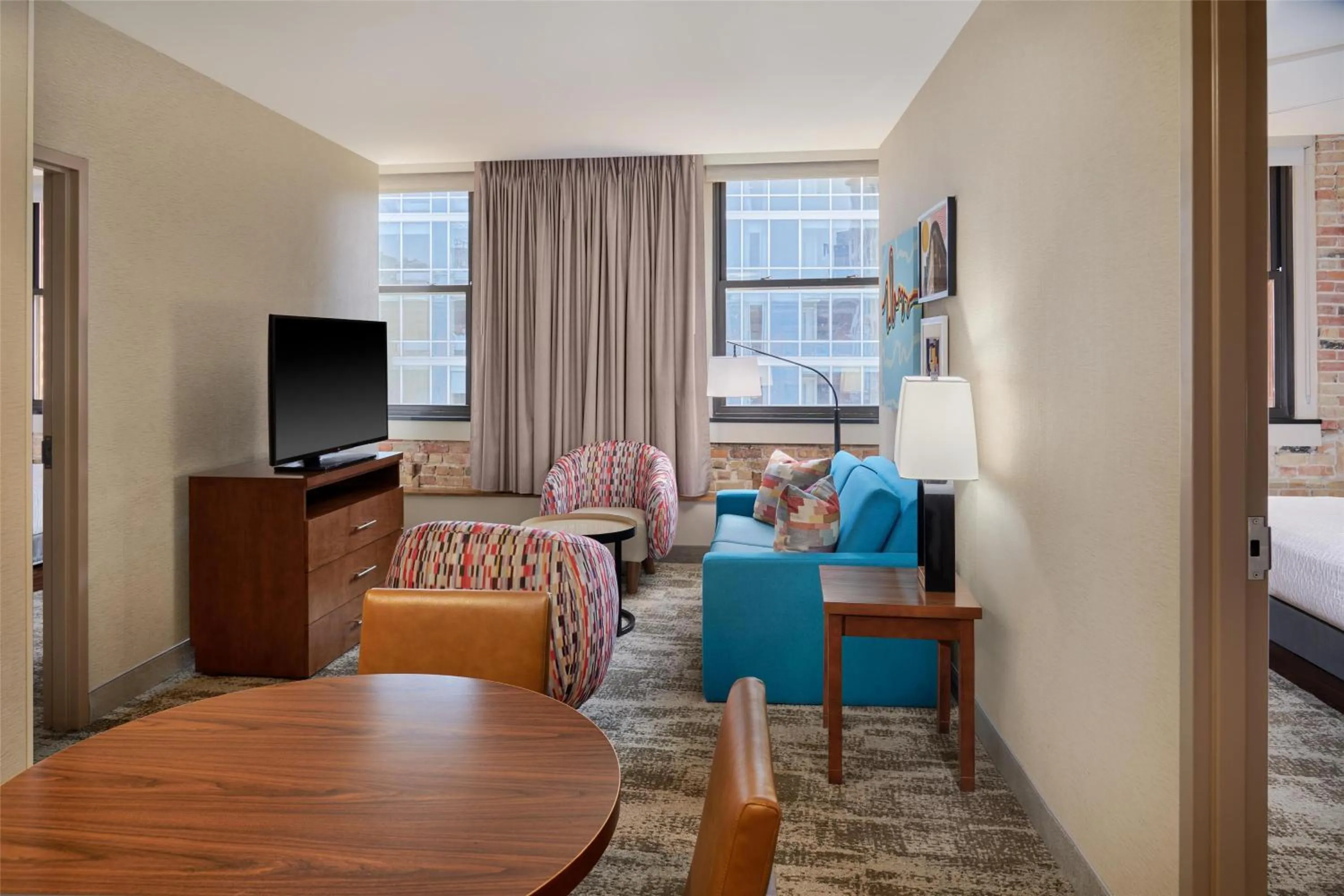 Living room, Bed in Homewood Suites by Hilton Grand Rapids Downtown