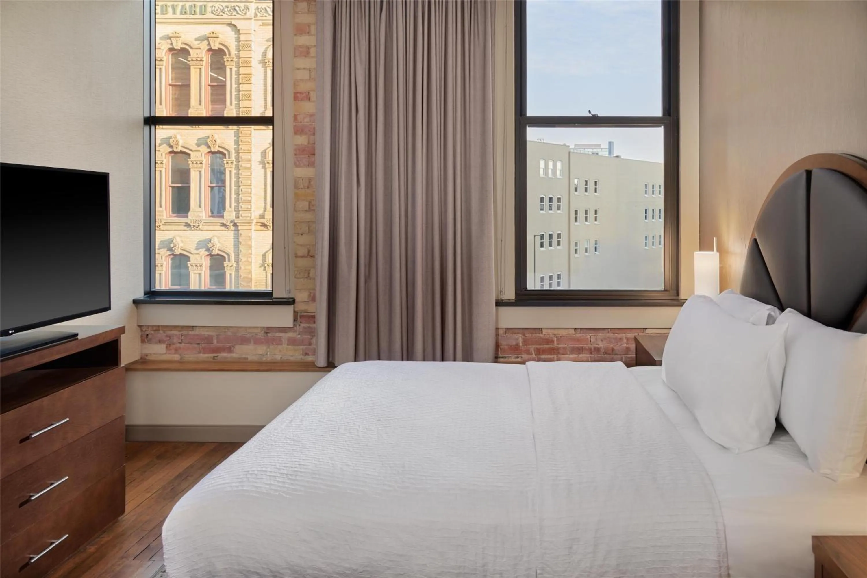 Bed in Homewood Suites by Hilton Grand Rapids Downtown