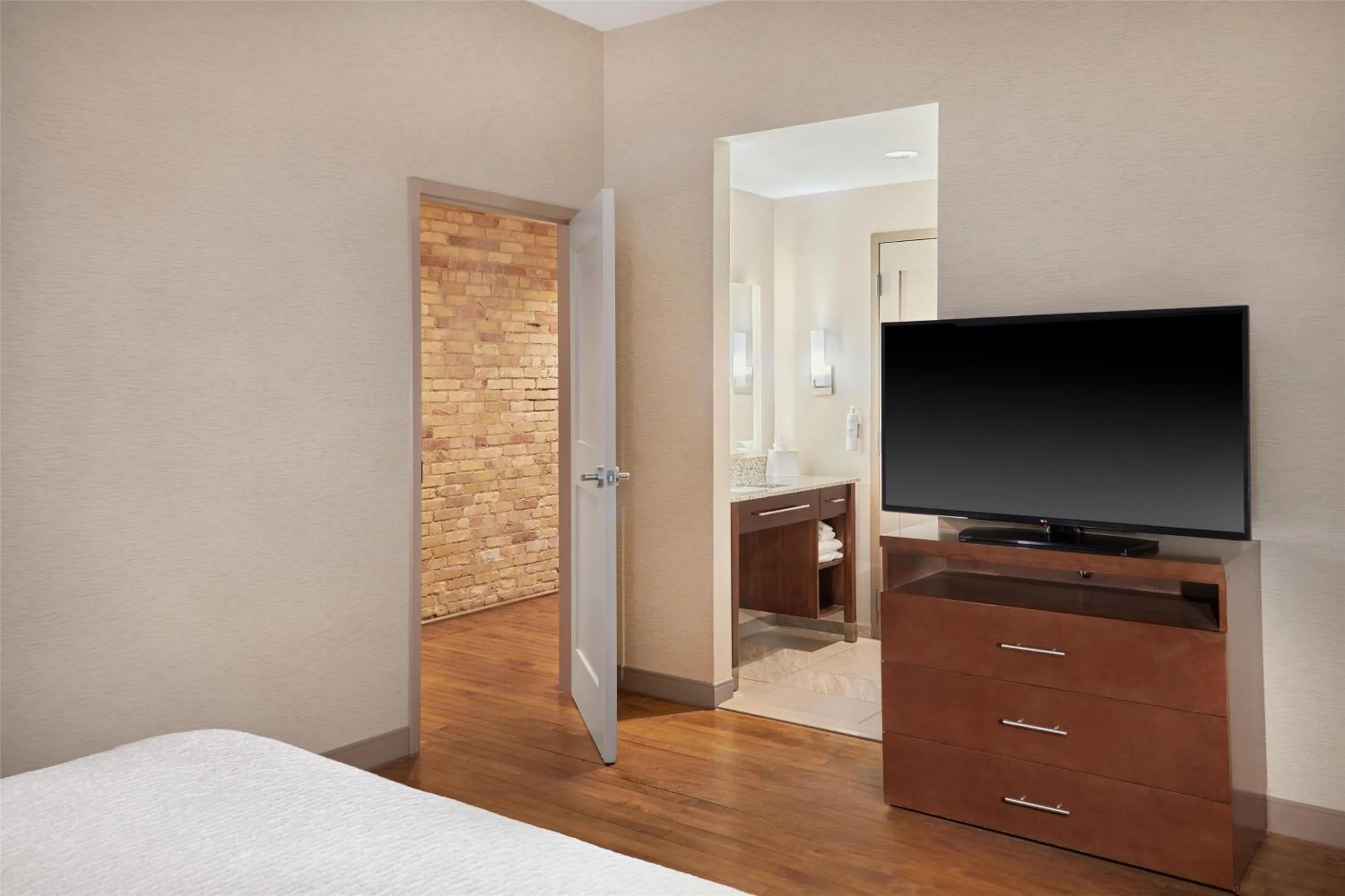 Bed in Homewood Suites by Hilton Grand Rapids Downtown