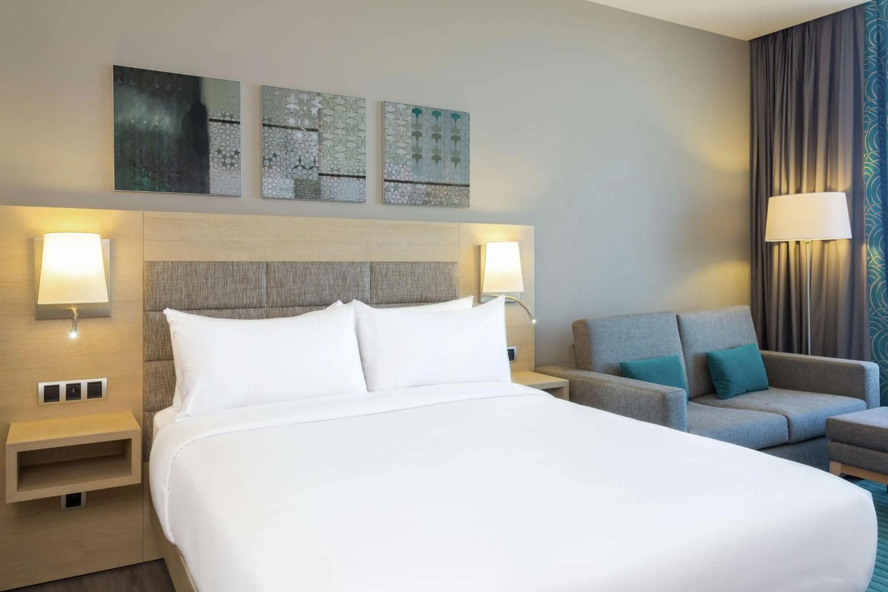 Living room, Bed in Hilton Garden Inn Tanger City Center