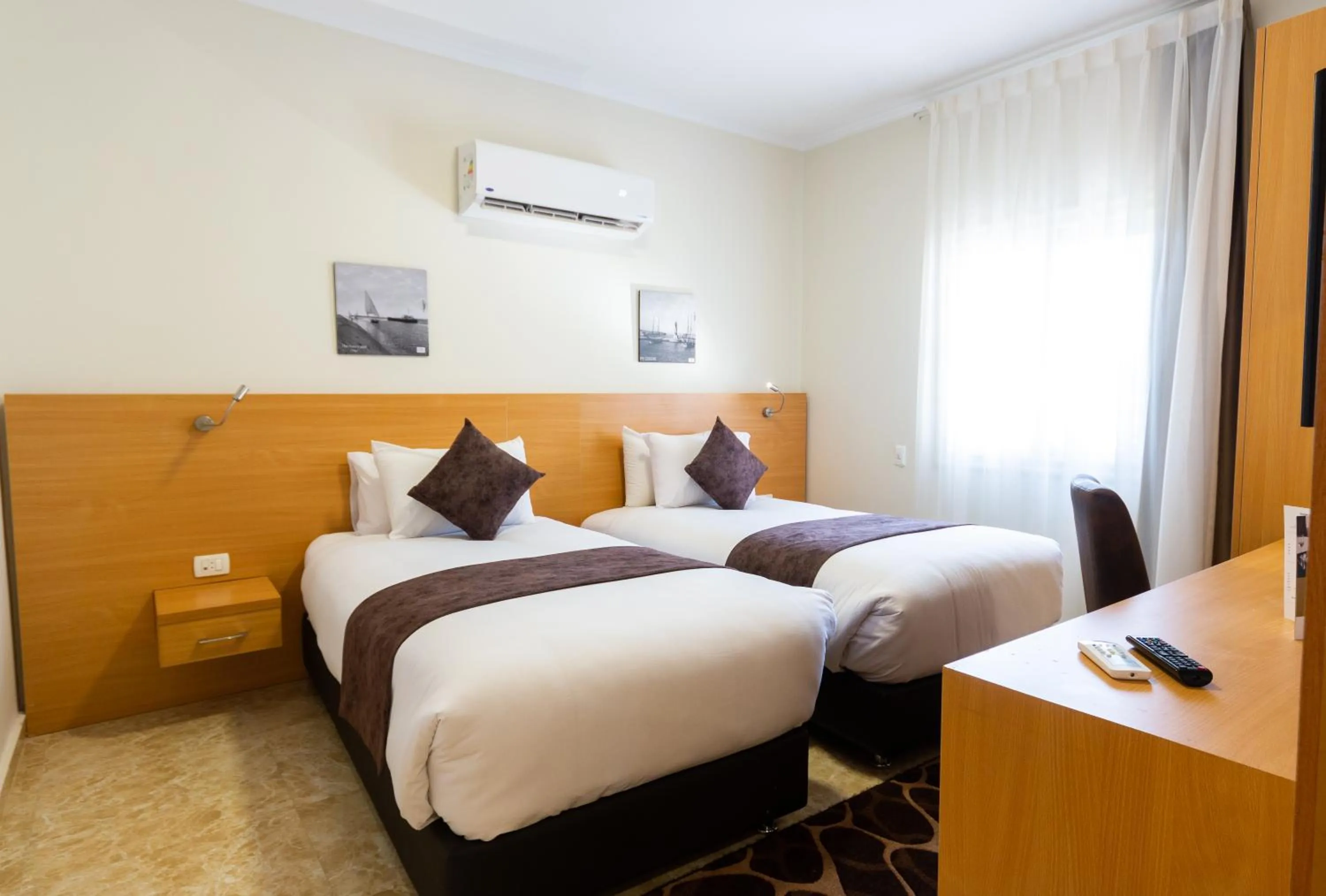 Bed in Mercure Ismailia Forsan Island