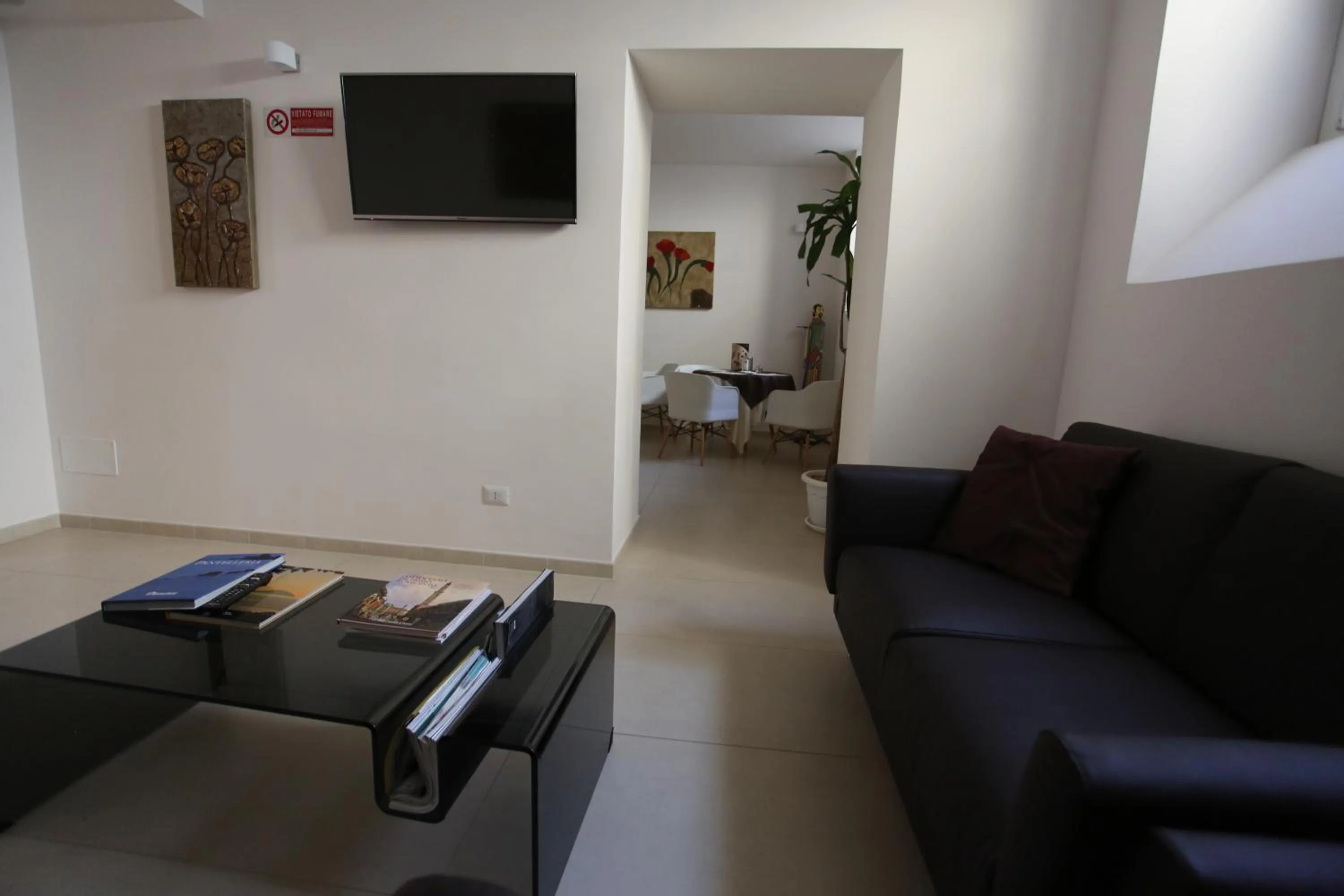 Communal lounge/ TV room in Hotel Eubea