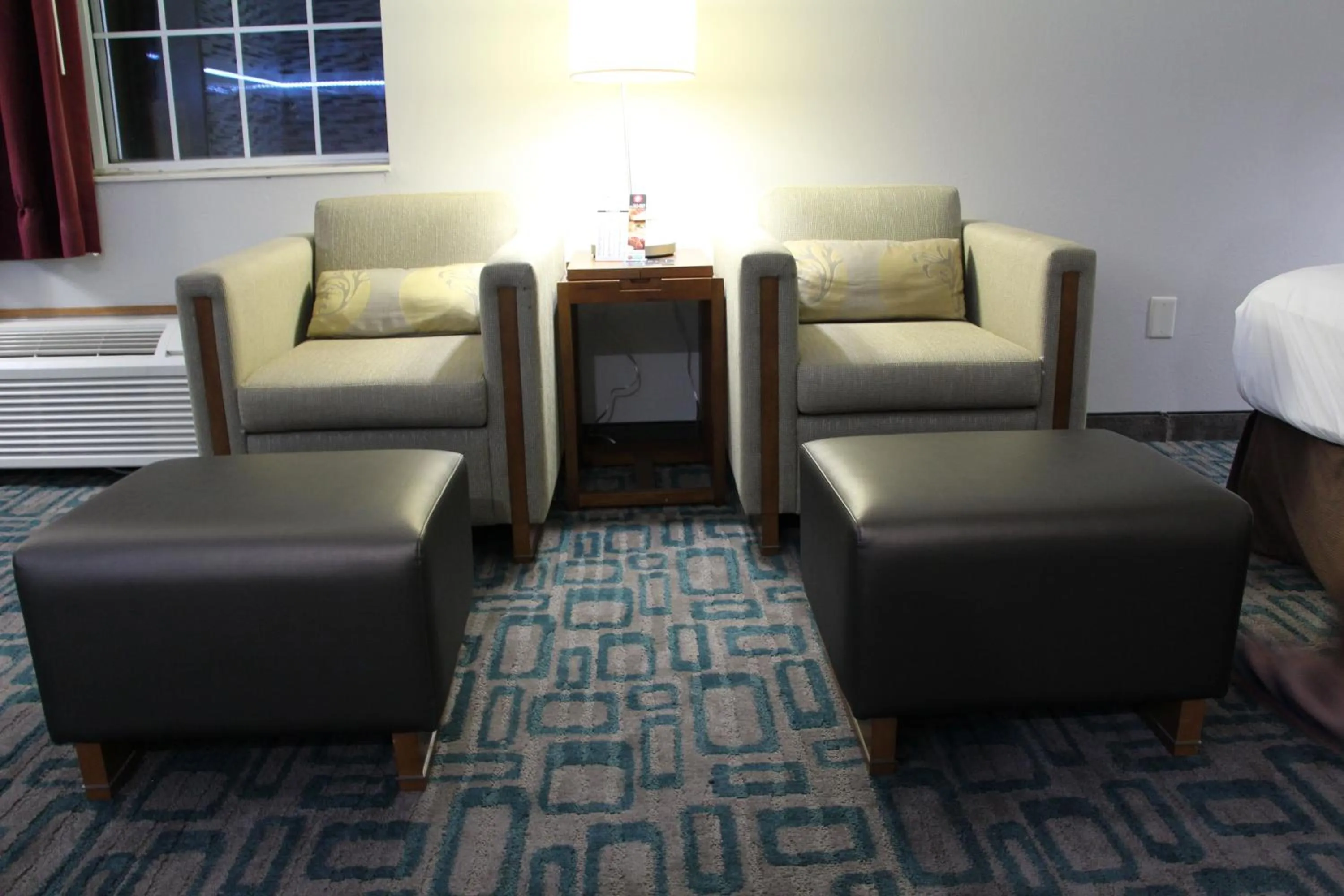 Seating area in Westbridge Inn & Suites