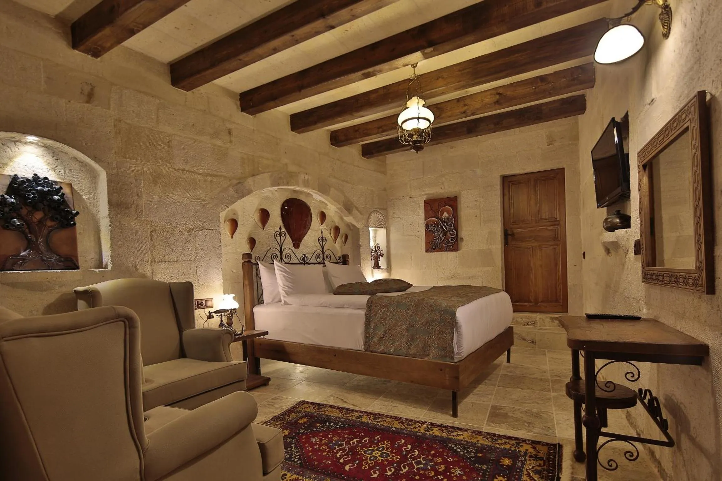 Bed in Aren Cave Hotel And Art Gallery