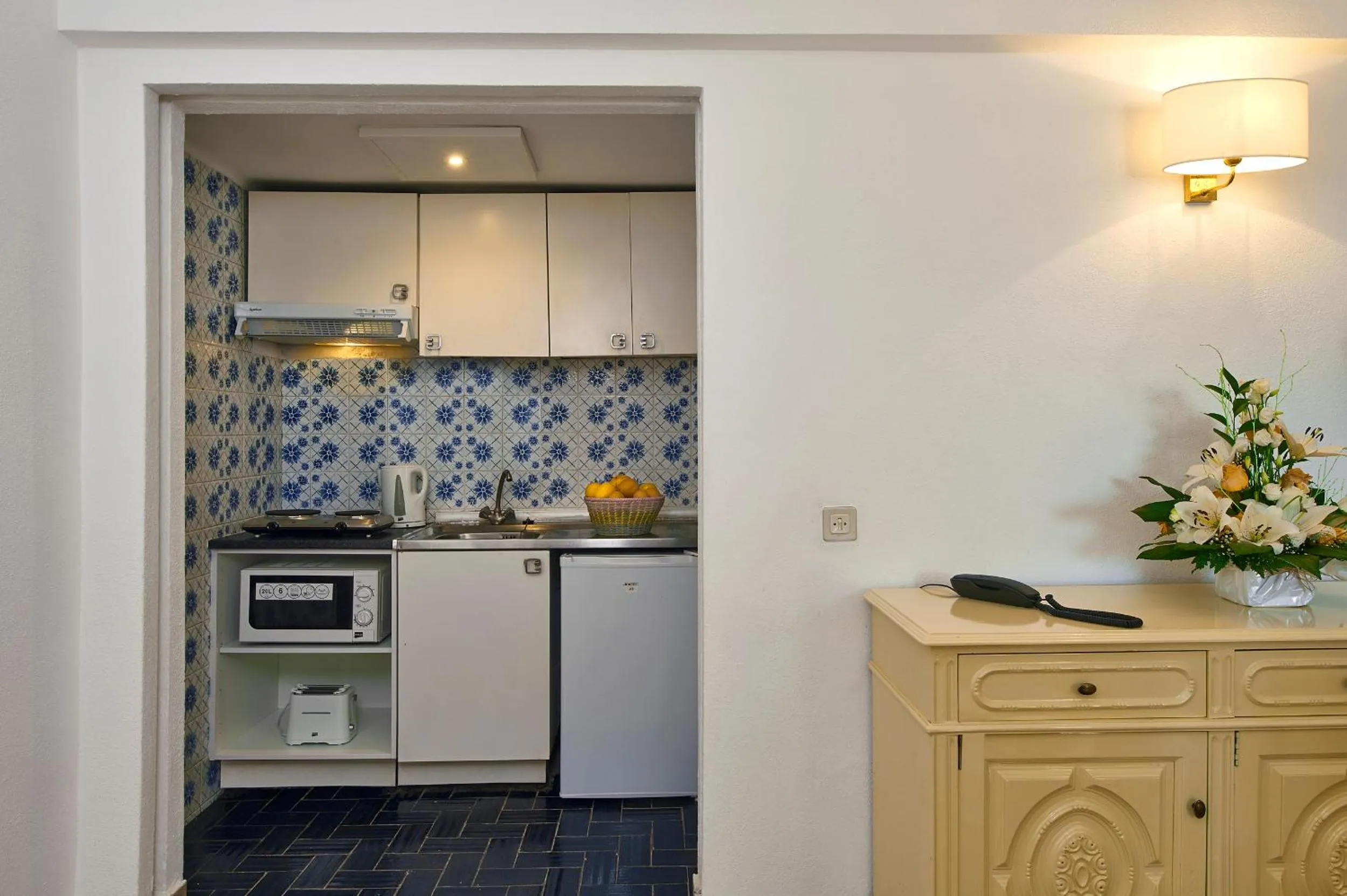 Kitchen or kitchenette in Cheerfulway Minichoro Apartamentos