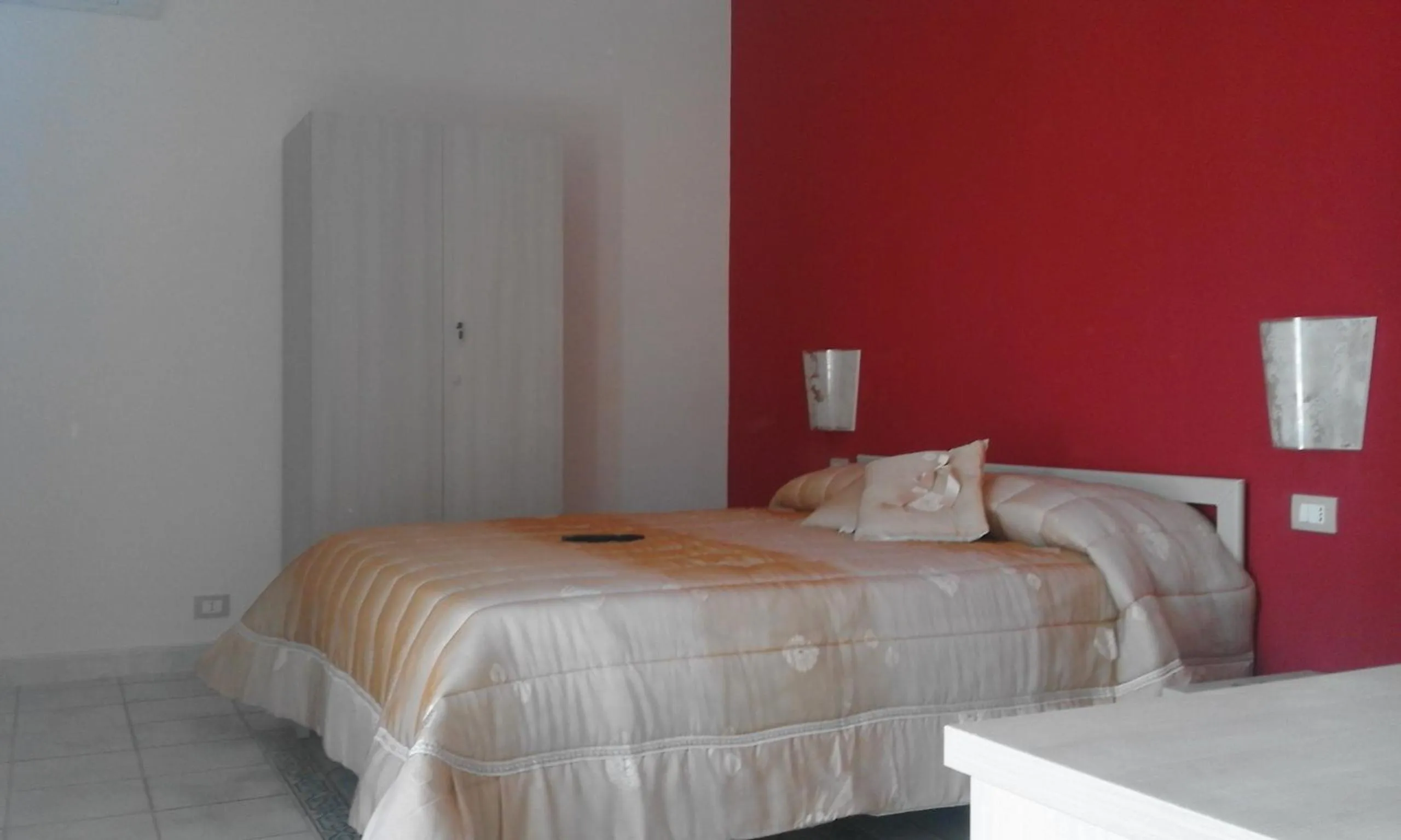 Bed in Modica Garden Resort