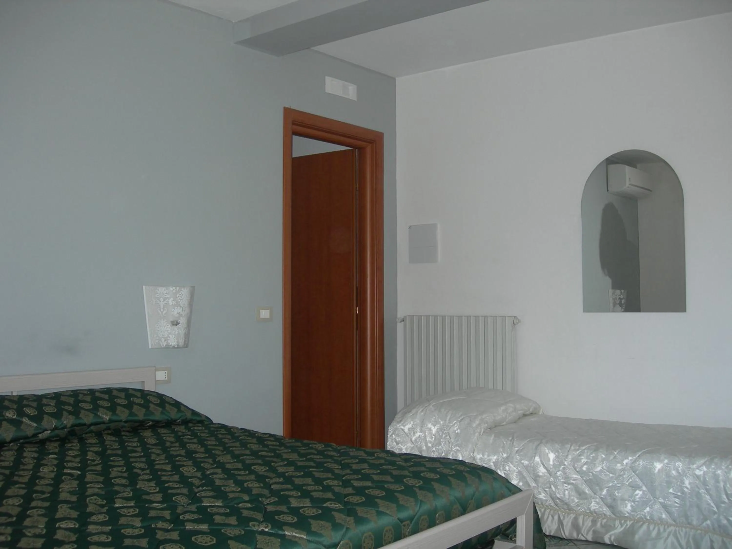 Bed in Modica Garden Resort