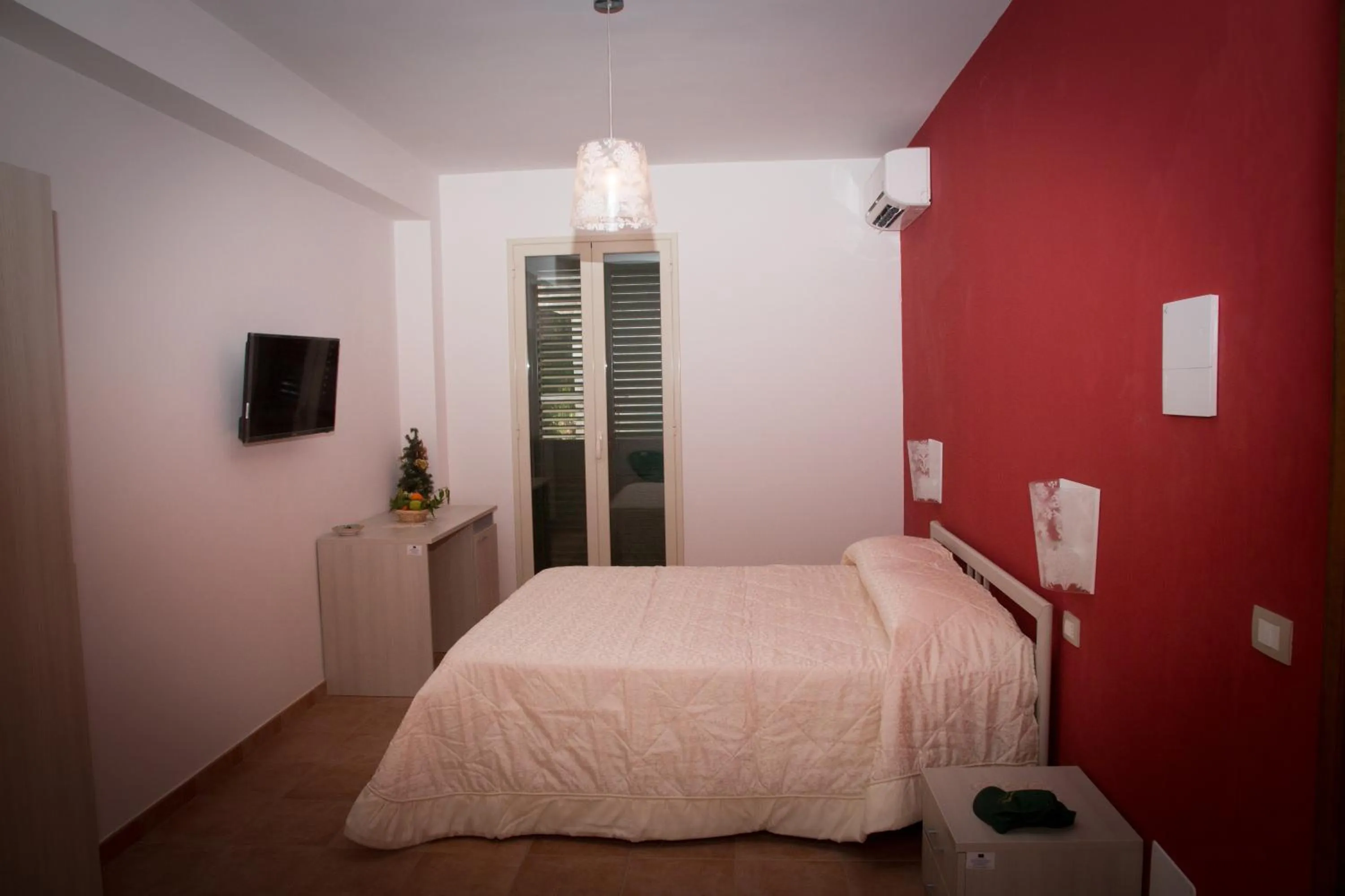 Bed in Modica Garden Resort