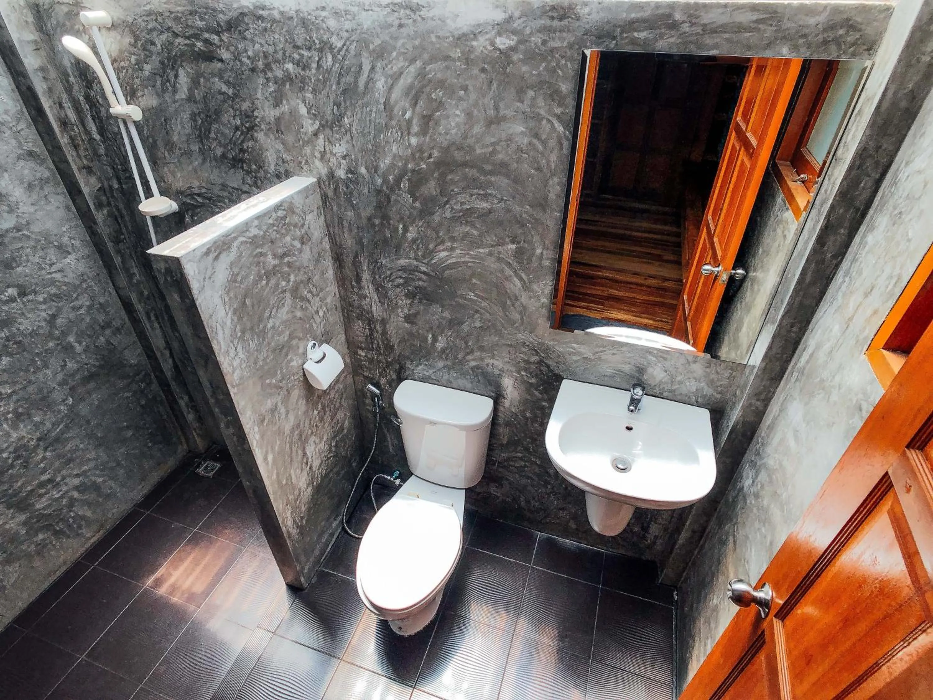 Shower in Colorful Hut