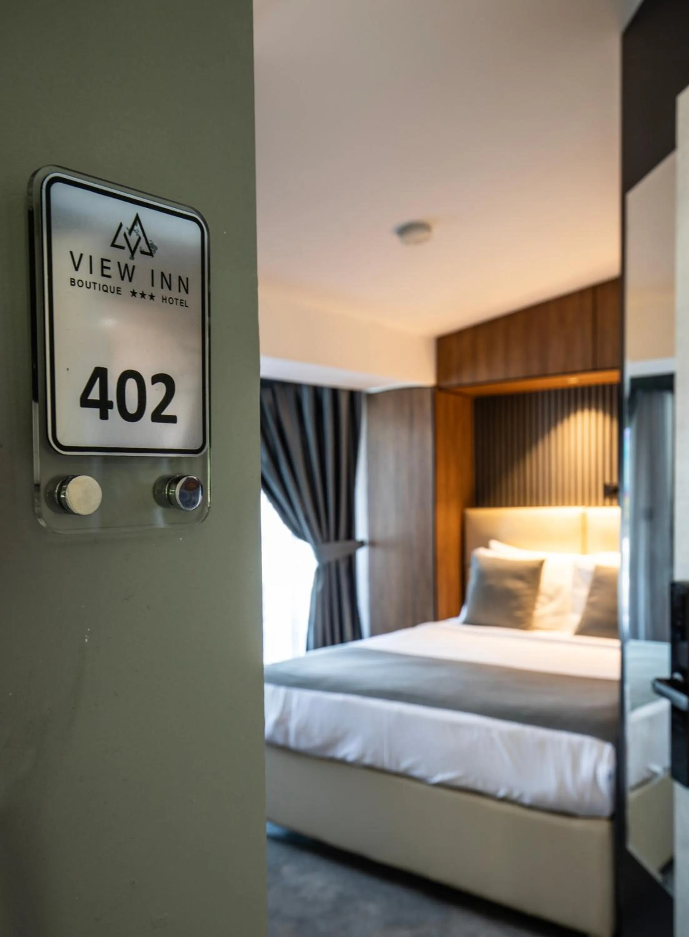 Bed in View Inn Boutique Hotel