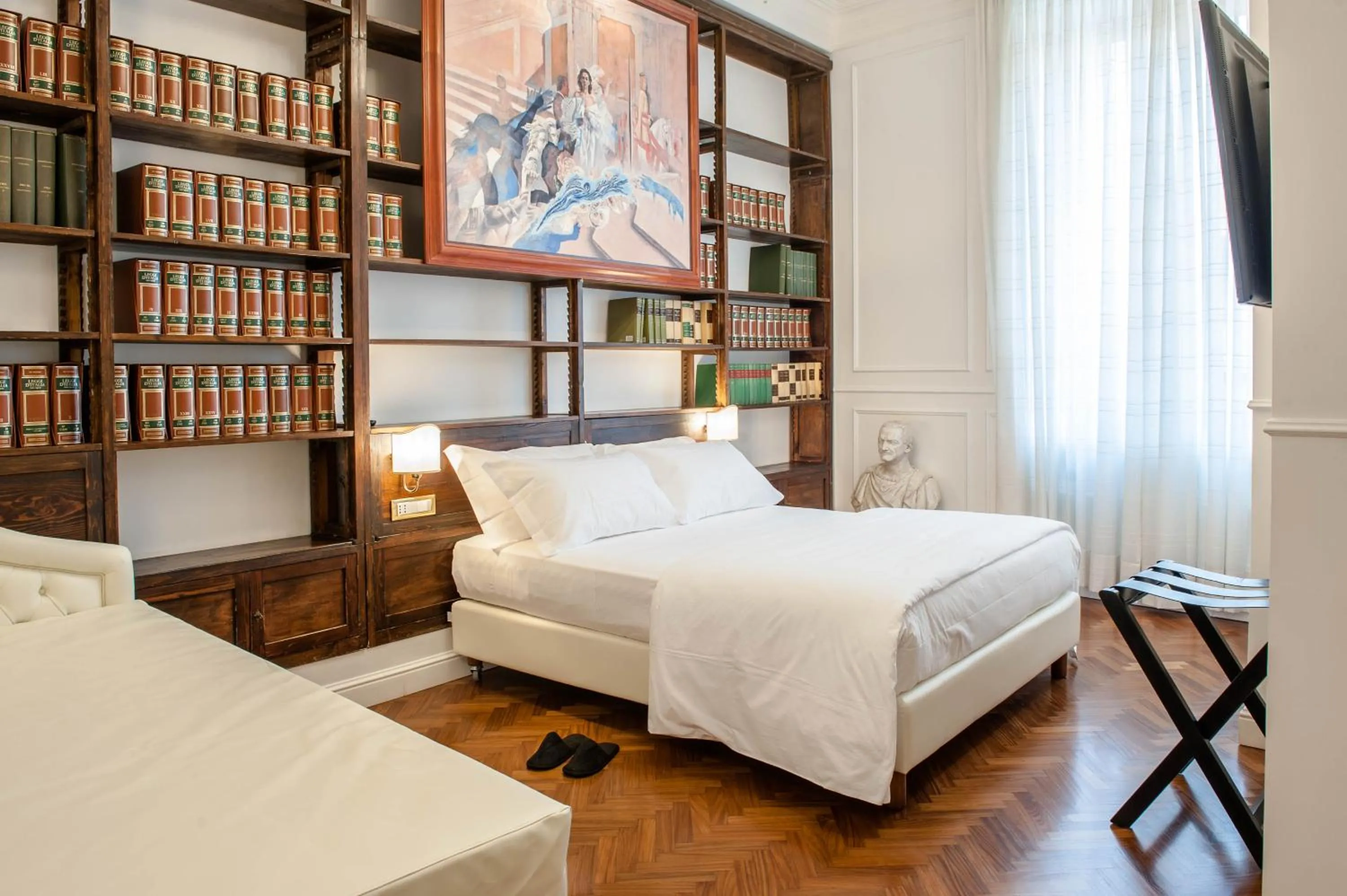 Bed in Navona Central Suites