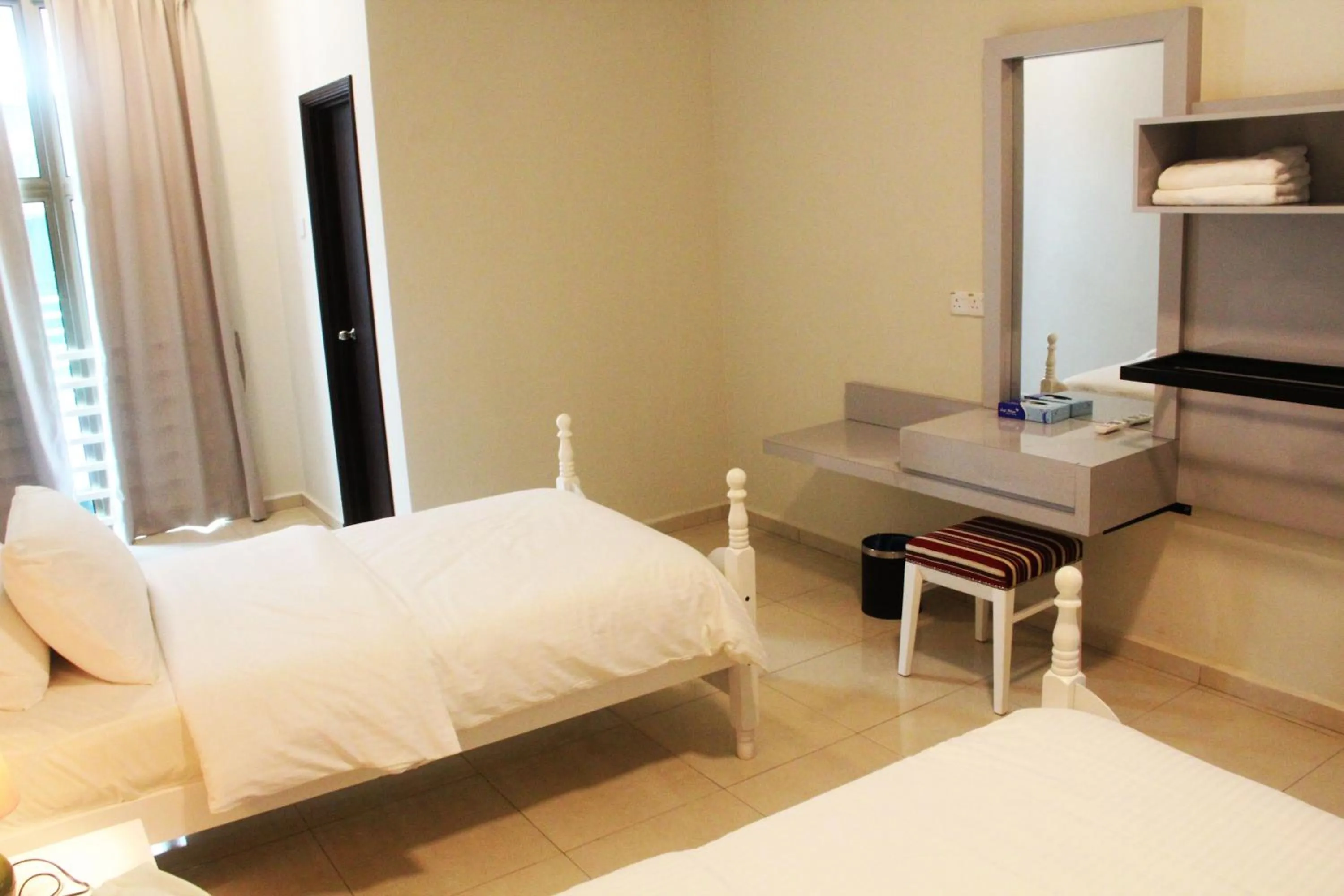 Bedroom in The Bliss Malacca