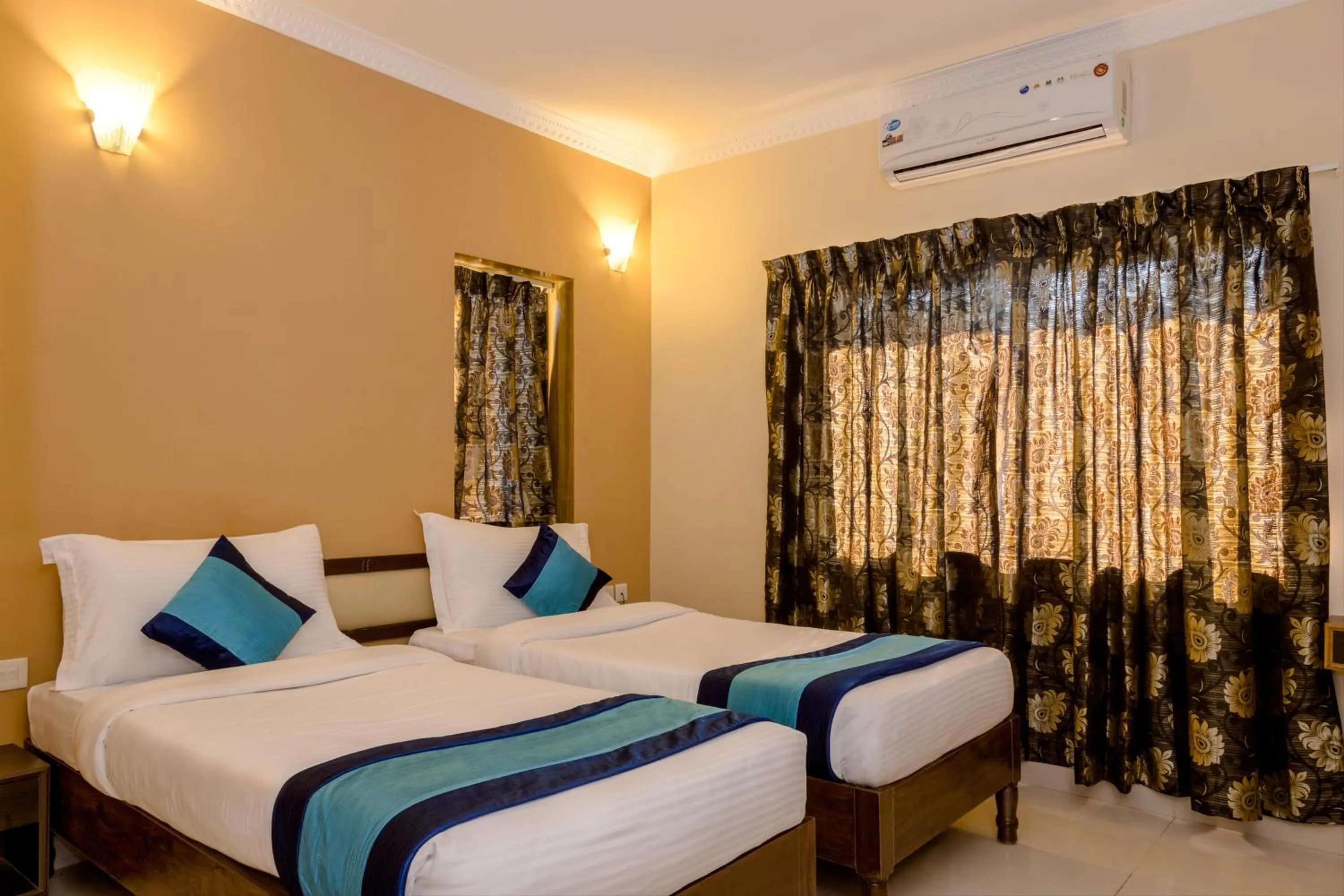 Bed in Rendezvous Beach Resort Panjim
