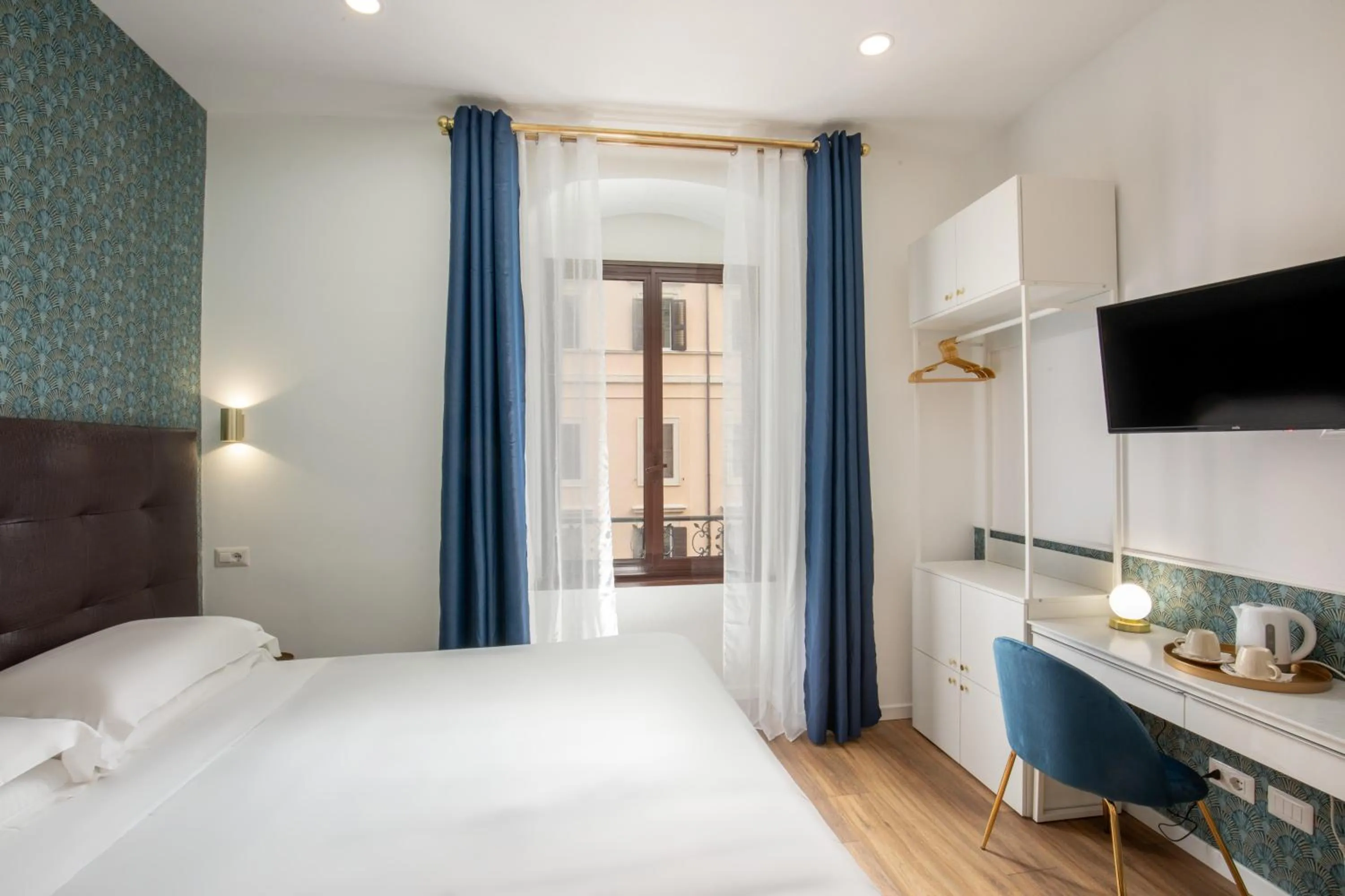 Bed in Amalia Suites by Remember Rome