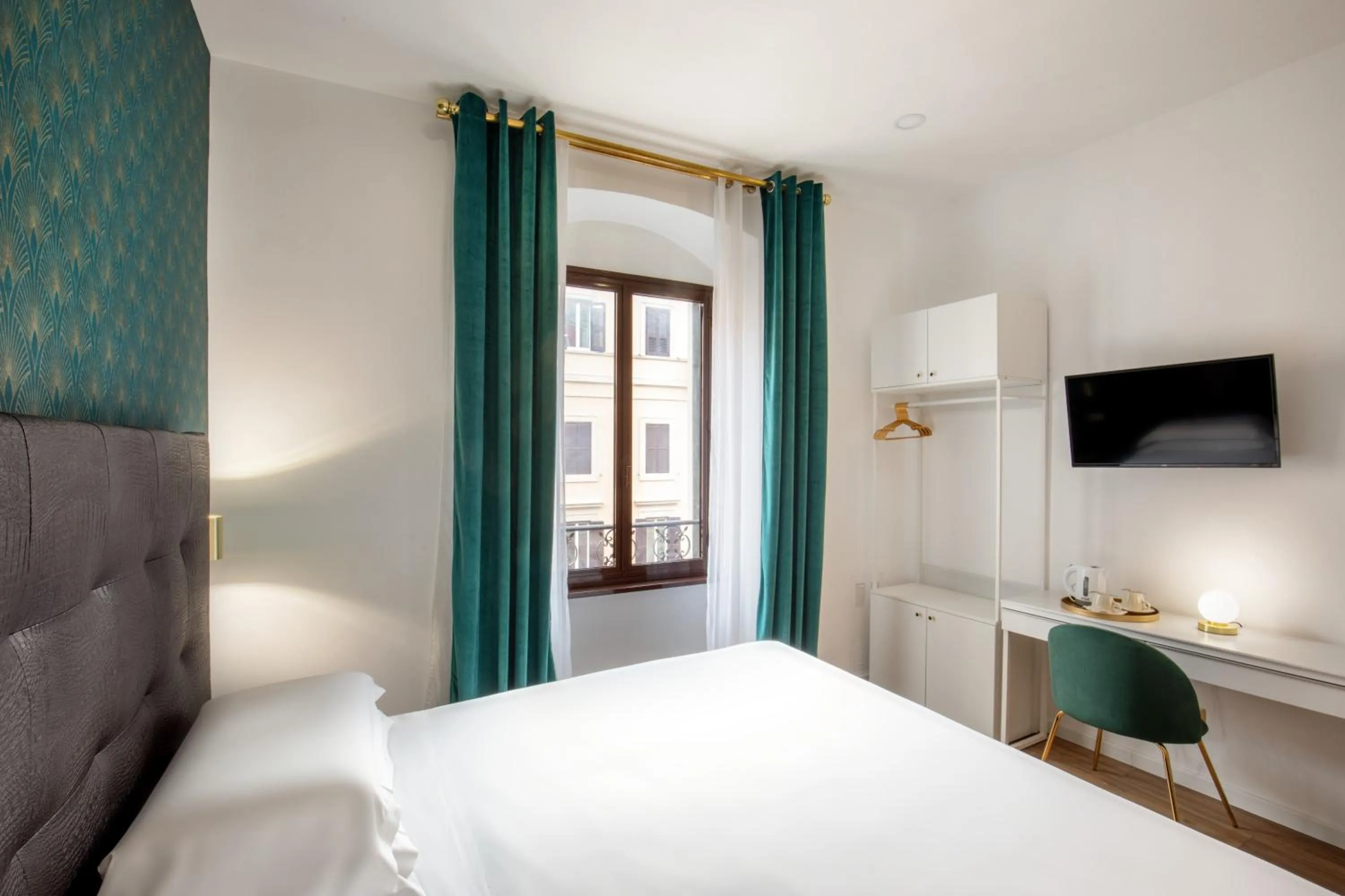 Bed in Amalia Suites by Remember Rome