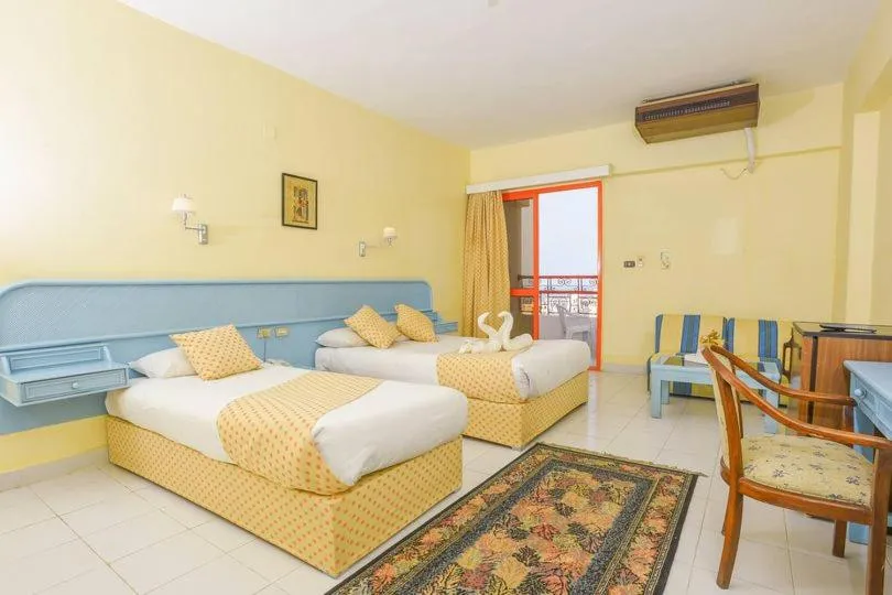 Living room, Bed in Empire Hotel Aqua Park