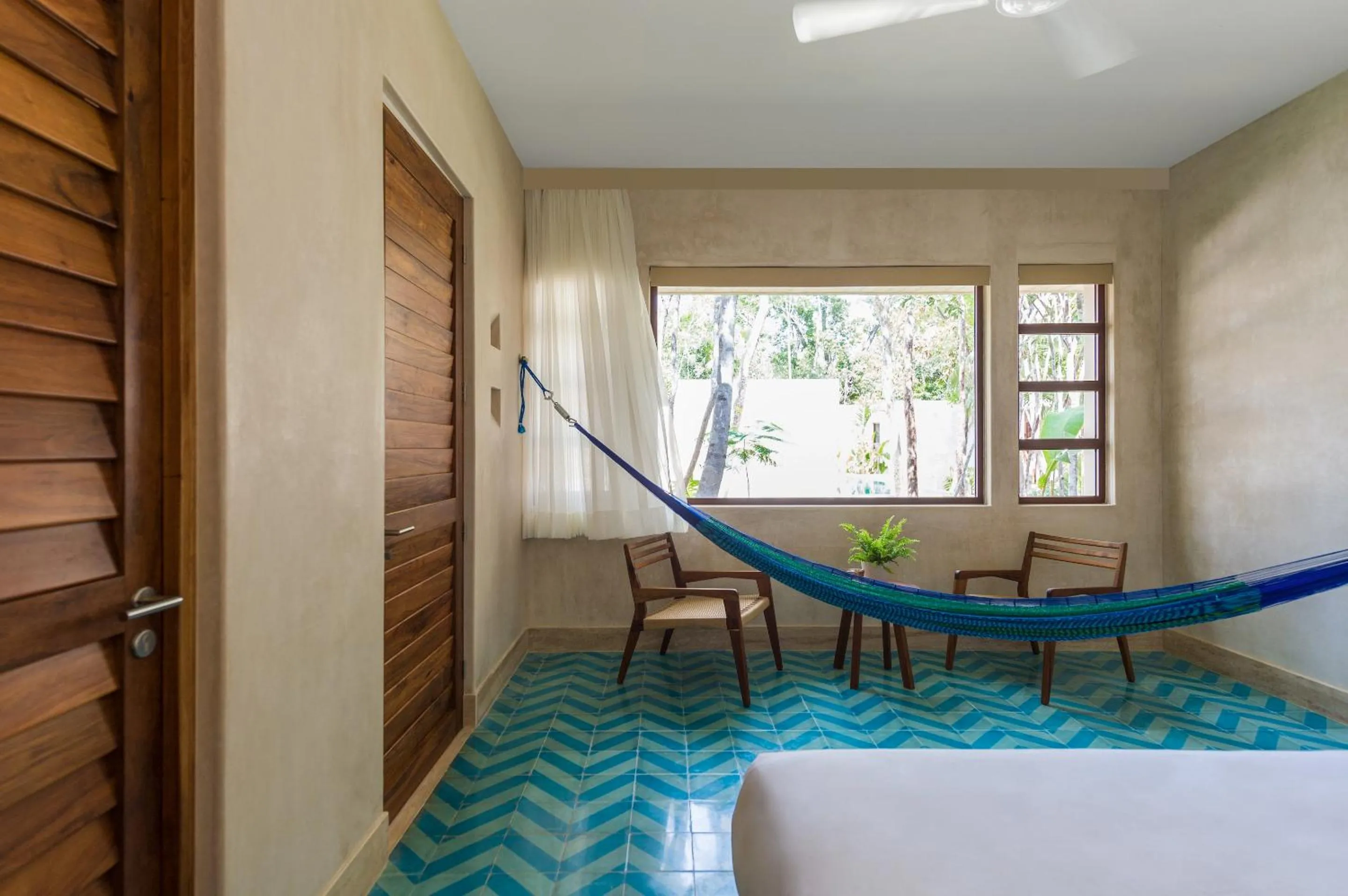 Seating area, Bed in Hotel Tiki Tiki Tulum