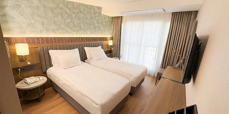 Bed in Paşapark Selçuklu Hotel