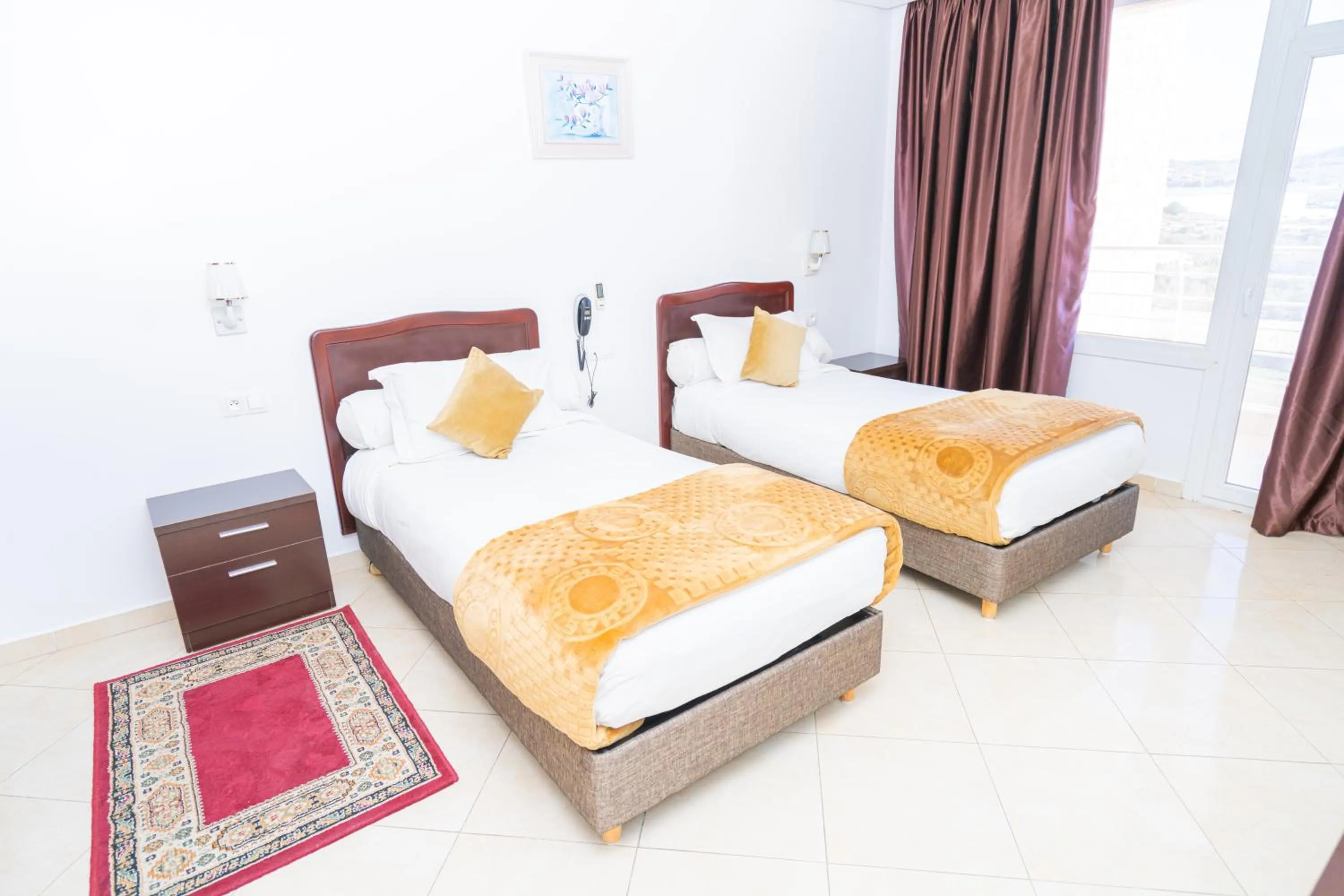 Bed in Tanger Med Hotel, Conference & Catering